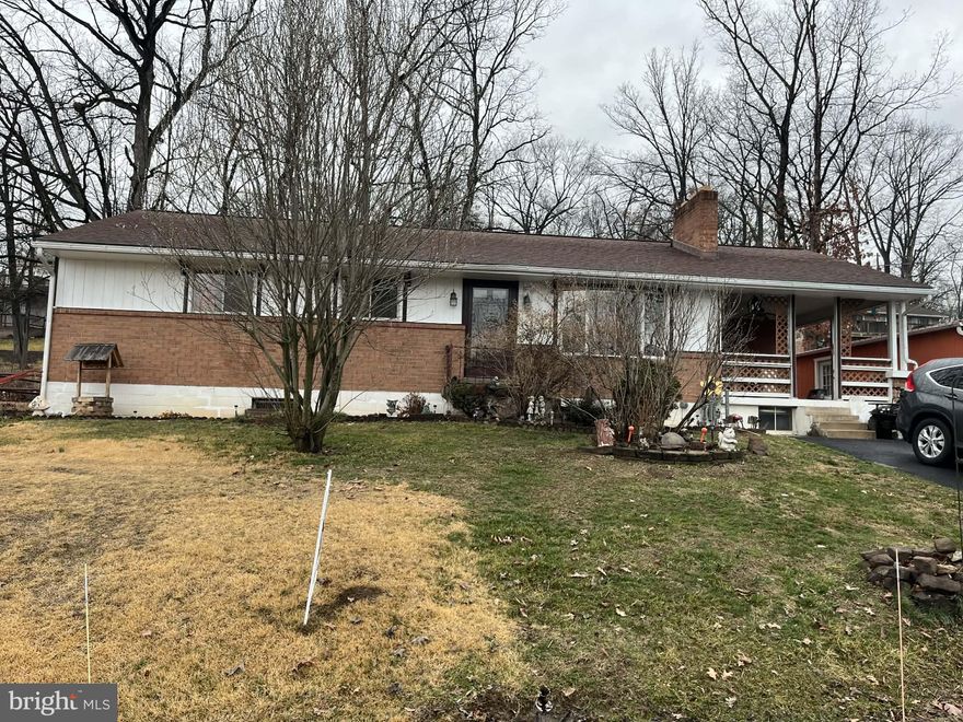 This property is located in Potomac Park - Across from Allegany County Fairgrounds - Rancher - 3 Bedroom - 2.5 Baths - Owner has worked very hard to prepare this house for market - Hardwood Floors throughout - Large Fully  Finished Basement w/Bar - New Bathroom  Flooring - Main Floor just completely painted - Central A/C - Natural Gas Heat w/Wood Burner - Detached Garage easily  fits 2 cars - Nice Backyard - Motivated Seller!