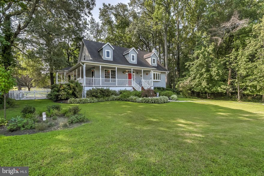 DON'T MISS OUT!! THIS GEM WILL GO FAST!! Rare opportunity to purchase meticulously designed custom built home on 2.4 acres.    ** CHECK OUT VIRTUAL TOUR FOR VIRTUAL SHOWINGS 24hrs a day ** https://my.matterport.com/show/?m=fz86xXxiFwL   This beautiful Cape Code welcomes you with a large wrap around porch; fully latticed and gated.  Enjoy your bump out gazebo with ceiling fan and light, and the large back deck. Porch and decking newly stained and water treated. The impeccable landscaping_will flower and bloom throughout_the year. The 2.4 acre property includes a large fenced area and red stone patio, 2 fenced horse fields, and surrounding trees providing privacy and natural views. Large paved driveway.  Inside you'll find 9' ceilings on the main level with lots of windows and natural light. Family room with wood burning fireplace and hand crafted mantle; living room and full bath.  The stunning kitchen provides large panel windows that look out onto your estate; two sinks, double ovens, lots of cabinet space, well-lit pantry, and glass cabinet. Dining room has french doors to the deck and wrap around porch.  Mudroom with washer/dryer. Upstairs large master suite with two ceiling fans, master bath with oversize tub, double headed shower and double vanity; two additional bedrooms and full second bath; fully finished and insulated storage areas.  Downstairs large finished space with 10' ceilings, dimmers on all lighting, half bath and surround sound system for entertaining.  Unfinished area with plenty of storage. Basement french doors with access to outside.  One mile from beautiful Down's Park and the Chesapeake Bay.  Easy access to route 100 & 97.   One Year Choice Ultimate plus HVAC Home Warranty provided.