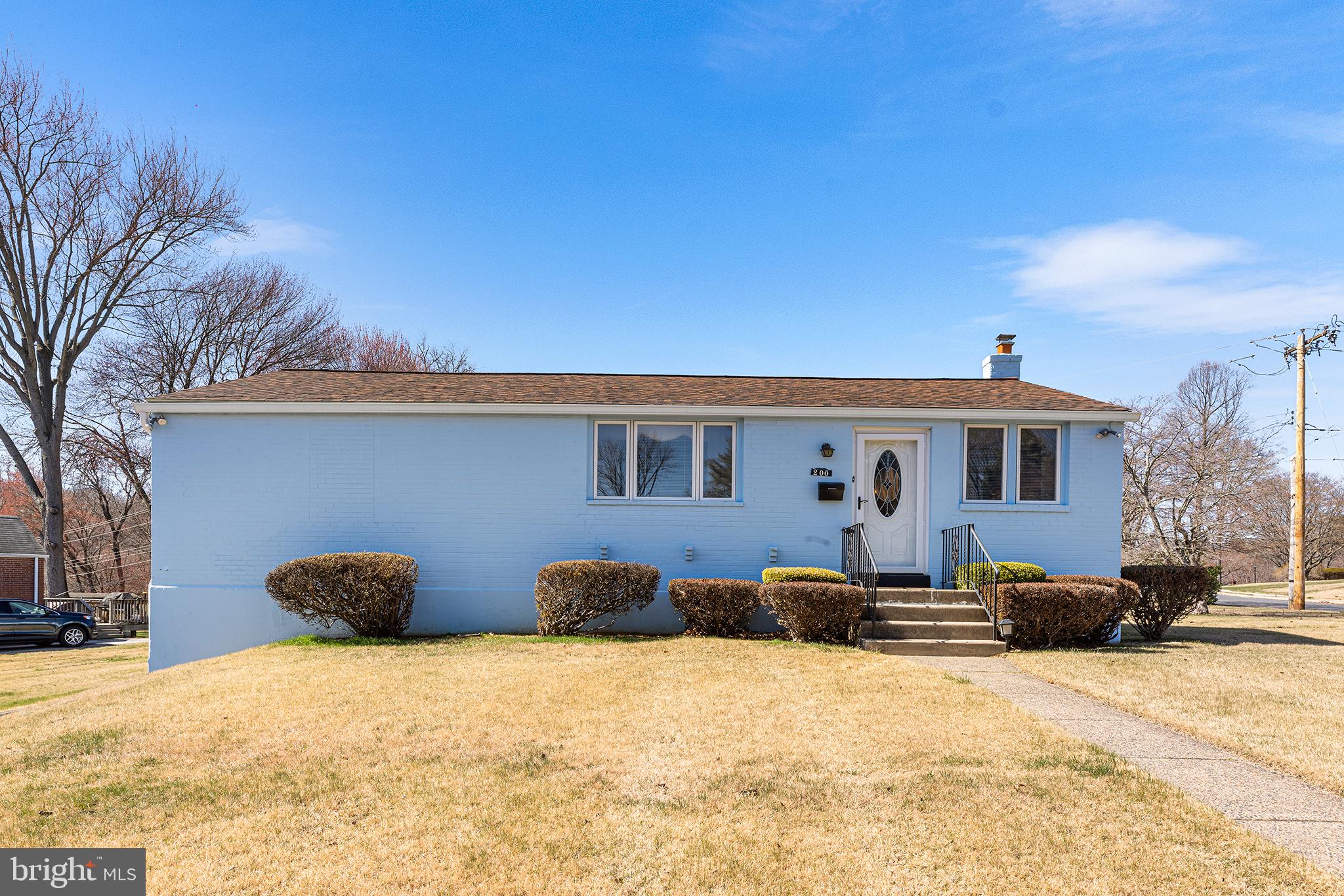 Come and see the only "Blue house on the corner " in Broomall! This beauty is an expanded ranch home on a large corner lot in desirable Marple Newtown School District. This updated home boasts a formal living room, formal dining room and a large eat in kitchen addition on the main level as well as two bedrooms and two full bathrooms. The kitchen is loaded with cabinets and counter space and flooded with lots of natural light. The lower level is a finished space with its own kitchen, full bath, space for a bedroom, sitting room, storage and an outside entrance. Perfect in law suite or for someone who wants their own living space. The house contains over 2500 square feet , when including the finished basement and the corner lot is approximately 1/3 of an acre. The basement has been completely renovated by the current owner including a perimeter waterproofing system. There are new floors throughout the house and fresh paint inside and outside. The Hot water heater and air conditioning are new, the roof, skylights and gutters are newly installed in 2022. This house has been well maintained by the current owner.