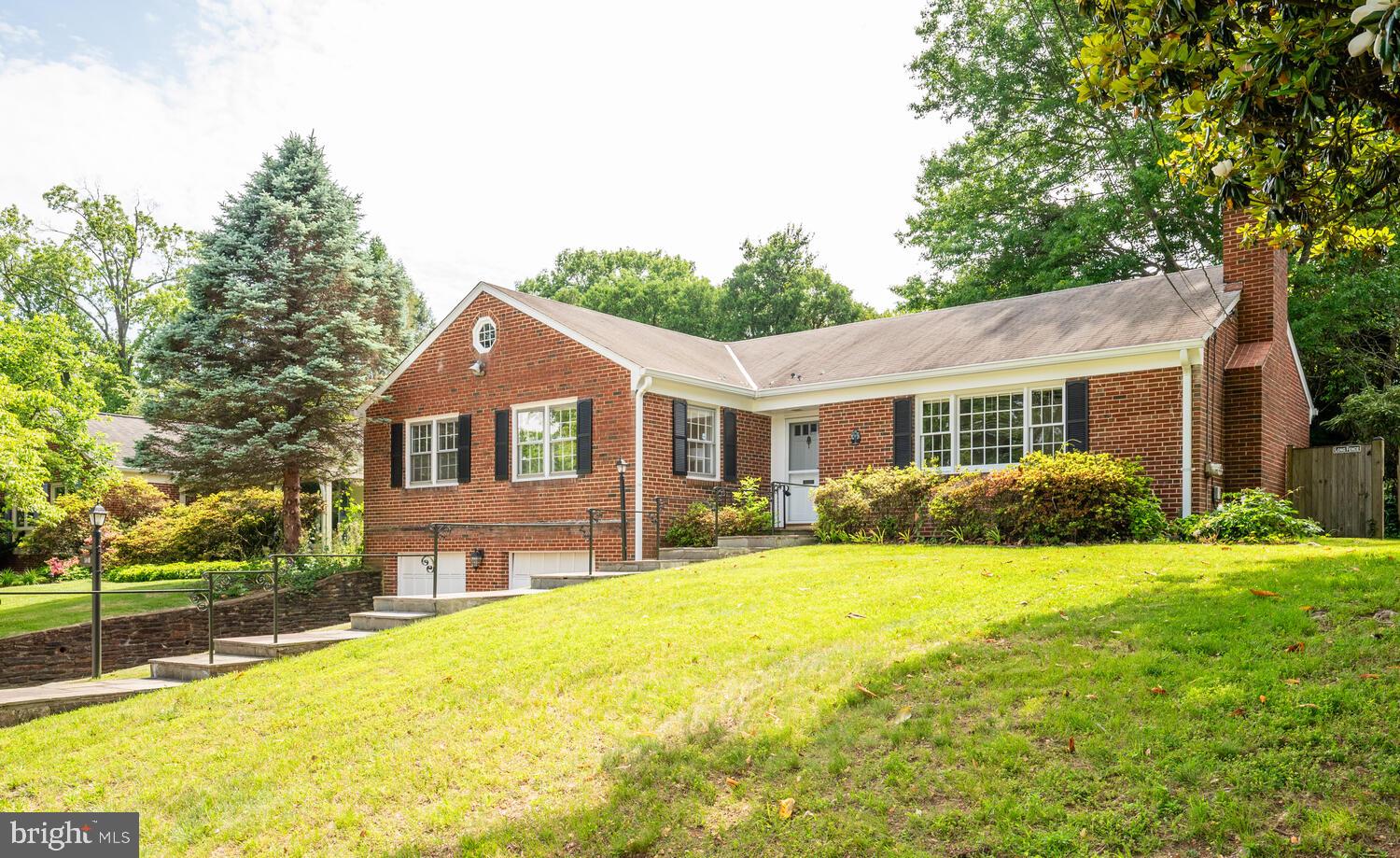 Open House 5/26 1-3 pm. Amazing opportunity in Sumner in Bethesda. Well maintained two-level brick rambler with 4 bedrooms, 2.5 bathrooms and two-car garage. Step inside to discover a spacious and sunlit living room, featuring large windows that flood the space with natural light. The wood-burning fireplace surrounded by built-in bookshelves creates a warm and inviting atmosphere, perfect for relaxing evenings at home. Just off the living room is the kitchen with new GE stainless steel appliances and separate dining area that opens to the private backyard patio via sliding glass doors.
The rest of the main level, featuring beautiful original wood floors, includes four bedrooms and two full bathrooms, including the primary suite.
The finished basement includes an office, a half bathroom, and a versatile family room that could serve as a den, gym, or playroom. The large utility room provides excellent storage space in addition to the two-car garage. The large driveway provides additional parking space and is set off by stacked stone retaining walls and slate stairway approach to the front door.
In February of 1949, Sumner received high recognition among 65 new developments from the National Association of Home Builders, recognizing the builder of single family homes that exhibited fine community planning. The citation noted that Sumner represented “ingenuity, originality, and soundness of design, construction, and suitability of the project to its location."
Located in the prestigious Sumner neighborhood of Bethesda, this home is just down the street from The Shops at Sumner Place with its array of shops and restaurants, the Sangamore Local Park and playground, the Washington Waldorf School and the National Intelligence University. With easy access to major commuter routes, this is a prime location for those working in Washington, D.C., and the surrounding areas.