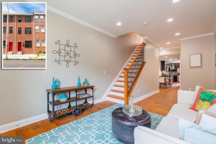 PICTURE PERFECT RENOVATION WITH 3 FINISHED LEVELS & OFF STREET PARKING! Gleaming hardwood floors throughout the main level, spacious living room and separate dining area, designer kitchen w/ granite counters, ss appliances, and tile backsplash, main level half bath, 2nd level w/ 2 large bedrooms and a hall bath, 3rd level Master suite w/ walk-in closet and full bath, unfinished basement that's perfect for storage, and off street parking! Conveniently located to UMMC, stadiums, and downtown Baltimore! Pack your bags and move right in!  TONS OF DOWN PAYMENT ASSISTANCE PROGRAMS AVAILABLE - ASK FOR DETAILS!