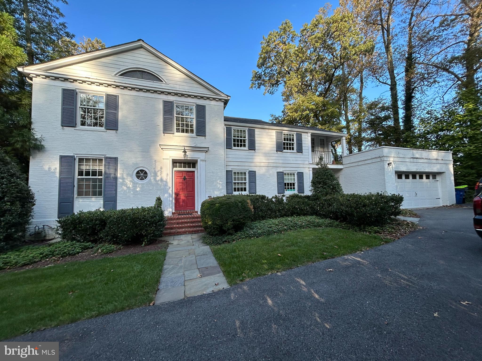 Brand New Listing! This home backs to the thirteenth green at Manor Country Club AND a full Manor Country Club Community Membership Conveys, with zero initiation fee! A wonderful opportunity to have the Manor Park address you've always wanted. This unusual property is comprised of three lots! Very unusual for Manor Park. As you near the driveway from Beverly Road, you gaze up the spacious lawn to see a quality built colonial home tucked in the trees with all the fine details you would expect in a Manor home. A low maintenance exterior features brick construction with an architectural shingle roof and many replacement windows. The entrance to your home is a flagstone walkway and front porch, stepping into a foyer with coat closet and beautiful staircase. The Main Level has gleaming hardwood floors throughout. The grand Living Room has built in bookshelves and ten foot ceilings and you can enjoy cozy nights in front of a wood burning fireplace. The Dining Room has an attached enclosed porch for relaxing and easy access to the kitchen . The kitchen has tile floors, a center island and a large breakfast room with plenty of space for a table overlooking golf course and easy access to the slate patio with a western exposure to see the sunset! There is also a den/office with built in bookshelves and a full bath! Large driveway with plenty of parking and a two car garage with a covered entry to the kitchen.
Two staircases, one in the main foyer and one off the kitchen, lead you upstairs to four bedrooms and three bathrooms. There is a huge hall linen closet and pull down attic steps leading to storage. The large Primary Bedroom has a walk in closet and in-suite full bath. There is a door accessed from the upstairs hall that opens to a landing with the opportunity to create a large deck area overlooking the golf course!
The Lower Level has a large finished room with full size windows, a laundry room, a workshop and a half bath.
The large lot(s) and proximity to Manor Country Club makes your home a tranquil spot, but still close to everything you need. It's a truly unique location in an extremely desirable neighborhood. Welcome home!
