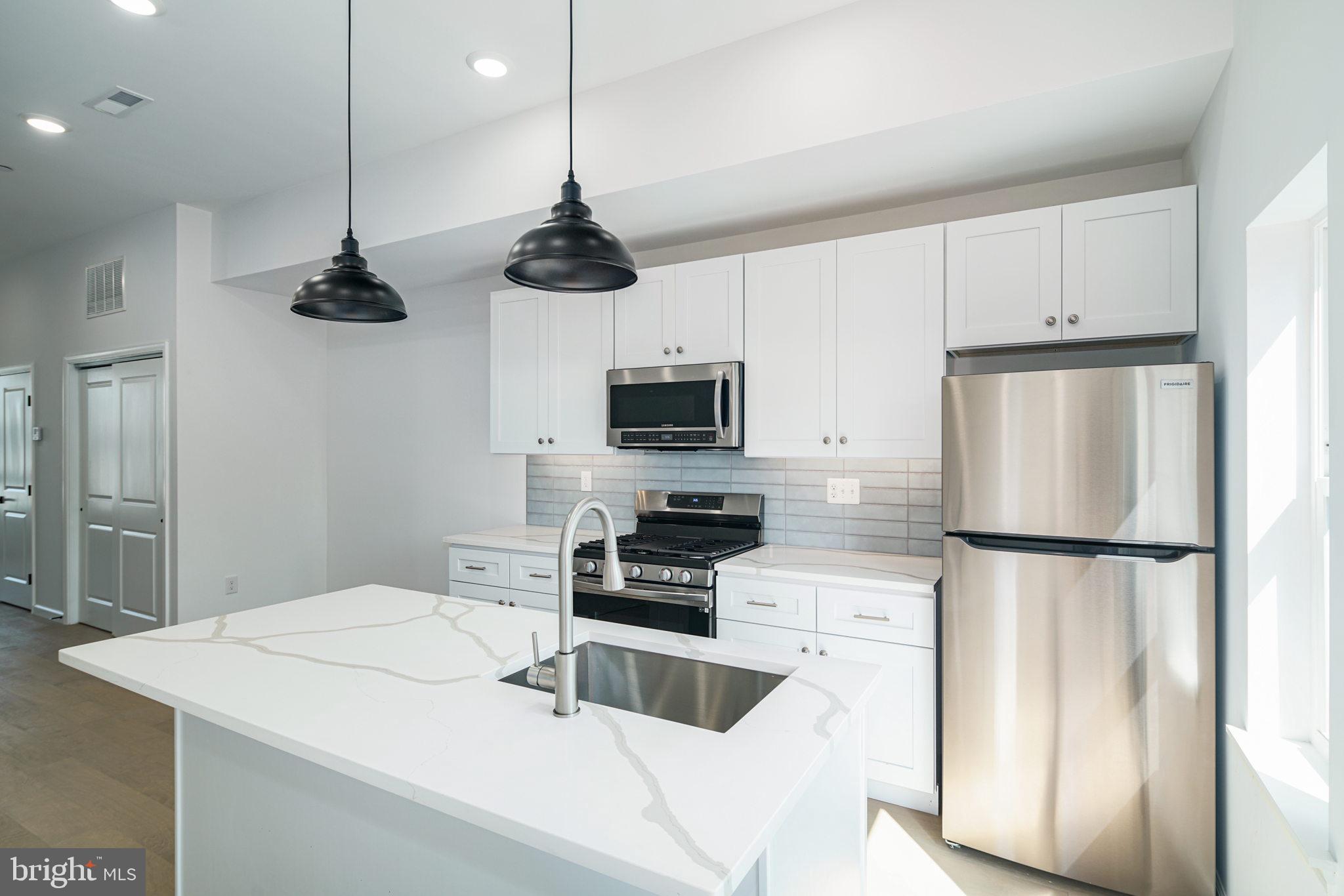 Amazing opportunity in Grays Ferry with full 10 year tax abatement! This is 3 new construction duplexes in a row. Each bottom unit has two bedrooms, two bathrooms with the bedrooms on the lower level. An open living area is on the main floor that boasts a gorgeous kitchen. Upper units also have two bedrooms and two bathrooms PLUS a roof deck. Another open concept living/dining and kitchen combo. Beautiful finishes throughout. Each duplex is +/- 2,000 SqFt. Taxes and square footage are the responsibility of the buyer to have verified.