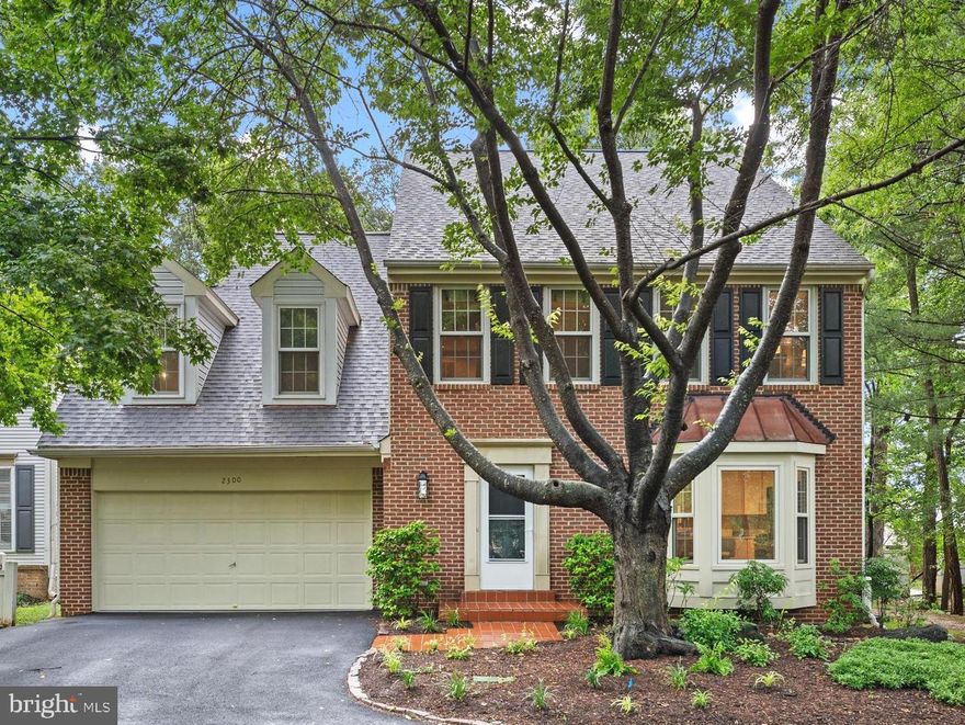 Welcome to this stunning 4-bedroom, 4.5-bathroom home, perfectly nestled on a wooded cul-de-sac in one of the area’s most sought-after locations—just minutes from Dunn Loring Metro, Tysons Corner, Mosaic District, West Falls Church Metro, and major commuter routes including I-495 and I-66. This move-in-ready home offers over three beautifully finished levels of refined living space, blending timeless design with high-end modern upgrades. A fully renovated eat-in kitchen (2025) is the heart of the home, showcasing sleek modern finishes, quartz countertops, and ample cabinetry—ideal for both casual meals and entertaining. The main level also features gleaming hardwood floors, recessed lighting, and a flowing layout that seamlessly connects formal living and dining spaces to a cozy family room with a fireplace and direct outdoor access through Pella sliding glass doors. Upstairs, the expansive primary suite offers comfort and style with a beautifully maintained bath, while a generous secondary suite over the garage and two additional bedrooms provide flexibility for guests, home office space, or multigenerational living. Recent updates include brand-new carpeting (2025) and a renovated hall bath (2017), along with custom built-ins and Pella windows that enhance both comfort and craftsmanship. The fully finished lower level is perfect for entertaining or relaxing, featuring tile flooring, a bar area, a fireplace, a media room with built-in surround sound, a dedicated exercise room, custom cabinetry, and abundant storage. Outside, enjoy a professionally landscaped front and back yard with an automated sprinkler system, a spacious deck, and an elegant stone patio. Major system upgrades offer peace of mind and include a new roof (2022), water heater (2023), heat pump (2023), fully repaved driveway (2021), and a whole-house gas backup generator. This exceptional home is also walking distance to the W&OD Trail, providing easy access to biking, jogging, or simply enjoying the outdoors. Combining unmatched location, thoughtfully updated interiors, and move-in-ready convenience, this home is an exceptional opportunity to live in comfort and style in one of the most connected and desirable communities in the region.