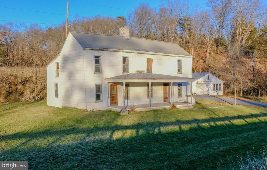 Calling all "Old House Lovers" and HGTV enthusiasts! This incredible opportunity is situated on 2.75 acres off RT 50 East and offers 3 large outbuildings perfect for all your hobby interests.  This spacious home offers a unique opportunity at a price that won't last long.  Come take a look and imagine the possibilities. This property is eligible under the First Look Initiative which expires after 20 full days on market. No investor offers until first look period expires.  No offers regardless of buyer type will be negotiated within the first 7 days of listing.