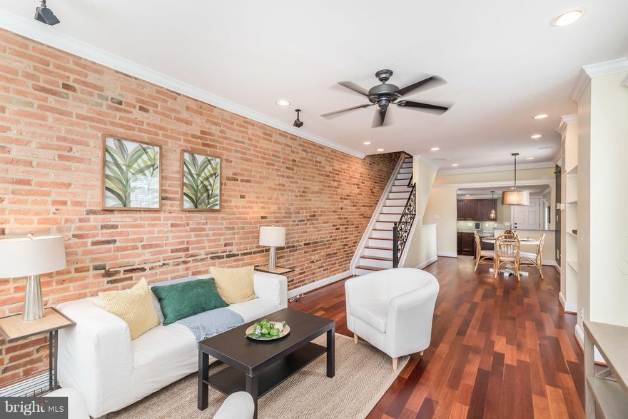 Beautifully renovated EOG 4 Bed, 4 FB rowhome in LP! This AMAZING home features OVER 2500 sq. ft. of living space, gorgeous wood floors, neutral colors, open layout w/ lots of light, sunken gourmet kitchen w/SS & bar, 1 CAR GARAGE,  2 MBed Suites, Rooftop DECK, Finished LL w/ FB, Entertainment Systems in LR & LL, Surround Sound, Intercom, Central Vac, Luxury Bathrooms, Walk-ins, too much to list!