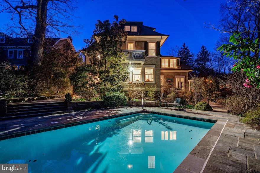This generational home is nestled on a 31,000 SF lot on one the most coveted streets in all of NW Washington.  The home has more than 6,000 SF of living space, and includes 7 bedrooms, five and half baths, and provides a warm and timeless elegance that is hard to find anywhere else.

Guests are immediately welcomed by the large, covered front porch and gracious foyer.  The grand living room is certainly the focal point of the main level, with 13 ft ceilings, an inviting fireplace, and custom built-ins. Oversized windows fill the room with natural light, while two sets of French doors lead to the back patio overlooking the immaculately manicured grounds, terrace and swimming pool.  Of course, the oversized, south-facing eat-in kitchen with large island, butler’s pantry, wet bar, powder room, formal dining room, back staircase, elevator and stunning library with its own enchanting fireplace and built-ins all complete the first floor. 

The second level is equally well proportioned, with four large bedrooms including a primary bedroom that is breathtaking with its expansive South and East facing views, generous closets and his and hers baths.  The oversized laundry room on this level is also a welcome addition. . The third floor features two additional bedrooms with a hall bathroom and a bonus room with a built-in window bench, providing plenty of space for guests. The lower level includes an additional bedroom with an en-suite full bathroom, and ample storage, including a wine room, and the potential to access the garage directly from the lower level. 

The outside grounds are absolutely stunning and include a flagstone patio off the main living area, and an in-ground pool with automatic cover.   The owner, a Master Gardener, created a magical oasis on the grounds with meandering trails, hidden picnic areas, and stunning flora throughout.  In fact, the garden was recognized as one of the greatest shade gardens on the East Coast by the American Horticultural Society.  

A driveway and a single-car garage (with possible expansion) provide convenient off-street parking. The home is two blocks from Rosedale Conservancy, and just a short walk to all of the shops, restaurants and attractions along Connecticut and Wisconsin Avenues, and within a half mile of the Cleveland Park Metro Station.