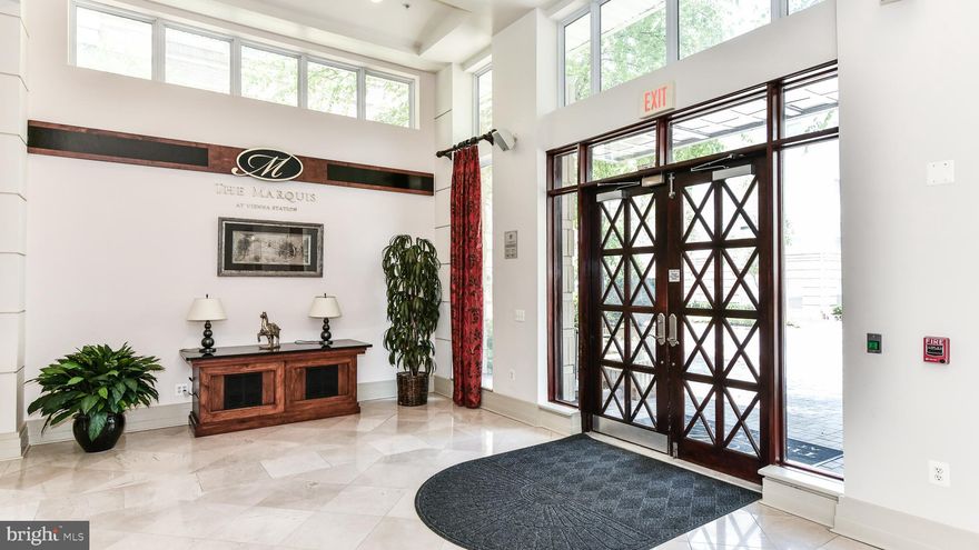 Welcome to your new home at The Marquis at Vienna Station, where style, convenience, and comfort converge. This beautifully maintained 2-bedroom, 2-bathroom condo offers the perfect blend of contemporary living and unbeatable location—directly across from the Vienna/Fairfax-GMU Metro station.

Step inside to an open-concept layout featuring high ceilings, large windows, and natural light that fills the spacious living and dining areas. 

The Marquis offers resort-style amenities, including a 24-hour fitness center, outdoor pool, clubhouse, cyber café, golf simulator, and indoor basketball court. With secured access, garage parking, and a pet-friendly community, you'll have everything you need just steps from your front door.