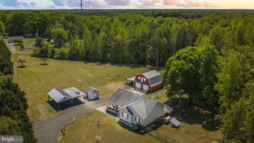 Welcome Home to This Custom Built Rambler on a Basement!!! 3 Bedrooms 3 Full Baths on almost 5 Acres, Minutes to 208, Lake Anna and Post Oak Middle School and Spotsylvania High School!!! Over 3000 Sqft of Living Space!! Partially Fenced-in Yard.  Inside of Home Offers Lots of Room with An Open Floor Plan, Real Hard Wood Flooring, Custom Stone Work, Geo Thermal Heating and Cooling,  Solar Panels ( Electric Bills are Practically Nothing) !  The Big Beautiul Barn Out Back is Approximately 30x30 with Electric.  The Shed on Property has a Mini Split System.  There is also a Carport with a Hookup for an Electric Vehicle.  The Generac Generator Will Convey.  All Furniture in the Property was Handmade and Will Convey.  Owner has had a Survey Completed on the Property; all Lines are Marked.  If  you are Looking for Country Living This is It!!! Bring Your Animals!! Chicken Coop On Property Will Convey Also!!! Plan Now to Come Take a Tour of This Beauty!!!