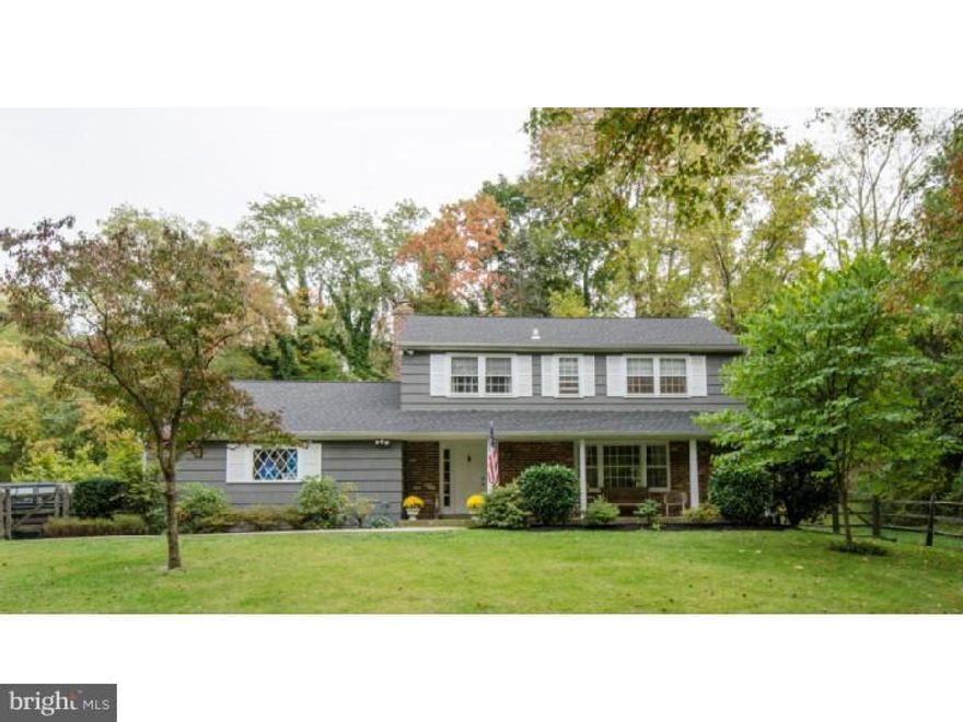New Price! Great value and opportunity in Radnor Township. Even Zillow agrees! Don't be sorry you missed it. Set way back off the road, this immaculate, bright and beautifully updated 4 bedroom 2-and-a-half bath home with fenced-in yard sits on 1.2 acres.  Gorgeous granite Madsen Kitchen with Luxor White Birch cabinetry, Green Hawaiian granite counters and Spanish Peronda tile backsplash and wainscoting. Neutral Italian porcelain tile floors and hardwood on first floor. Living Room with large picture window, Dining Room w/chair rail and Family Room with brick fireplace, w/door to back patio and yard.  Kohler Memoirs Powder Room, Newly Remodeled Hall Bathroom on 2nd Floor with white subway tile surrounds, hardwood under carpet on 2nd floor, Newer Central Air, 3-year-old roof, 2-car att garage make this ready to move in and start enjoying. Elementary School has FULL DAY KINDERGARTEN. Minutes from the Blue Route, and easy access to Center City Philadelphia, Phila Airport, as well as Bryn Mawr and the Main Line. Don't miss this one!