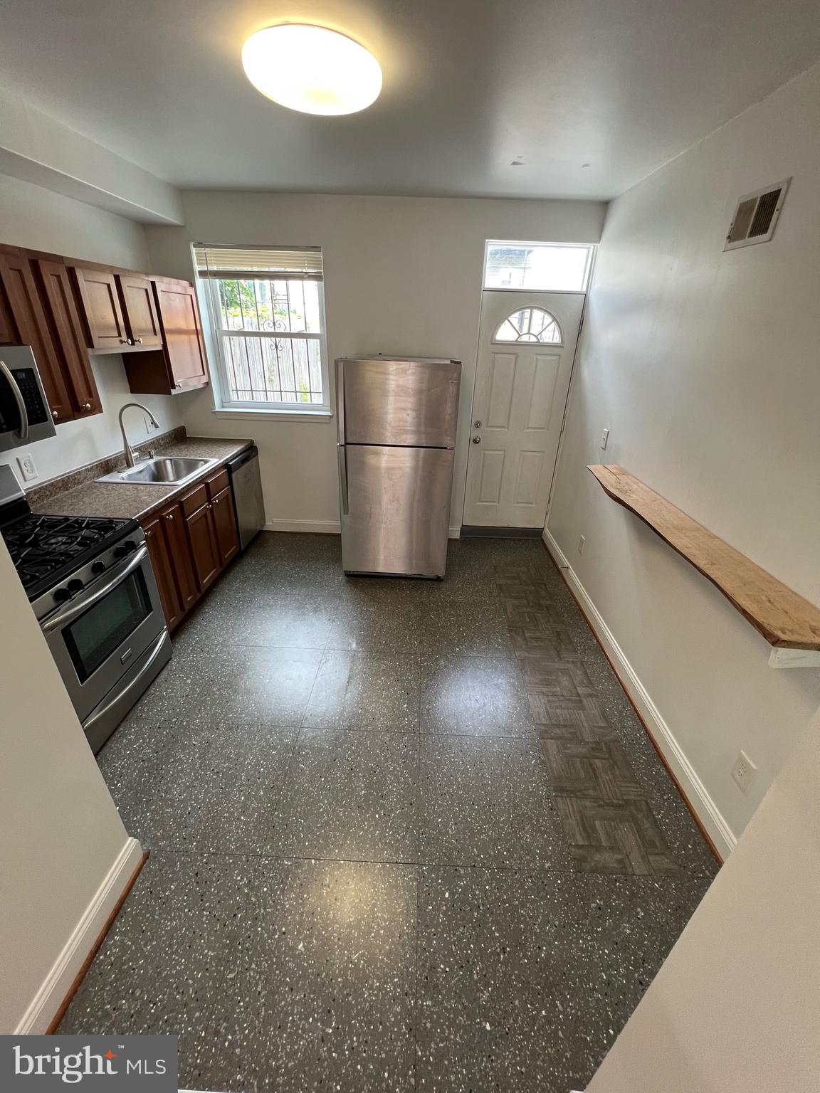 Come and tour this recently renovated townhome in Baltimore before it's gone! This 2-bedroom, 1.5-bath home has much to offer and is turn-key ready for its next tenant. The unit features all updated flooring and new carpet throughout. The home has been freshly painted, and both bedrooms are spacious and move-in ready. The backyard boasts a brand-new poured concrete driveway that can fit multiple cars. There’s also a spacious basement - perfect for a home gym or additional storage. Owner will consider pets on a case-by-case basis. Available for immediate move-in!