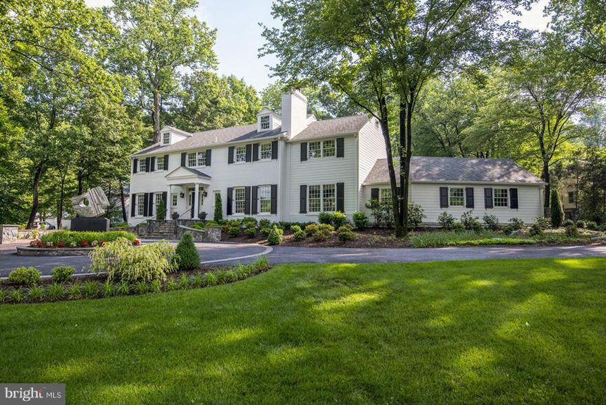 Renovated from top to bottom. Located on almost 3/4 ac on one of Bethesda's best streets. Features include new windows & doors, wonderful moldings, high ceilings, custom lighting fixtures, "Top of the Line"  gourmet kitchen @ center island open to breakfast area & family room, new bathrooms, hardwood on the first & second floors.  The exterior has a circular drive with extra courtyard parking.