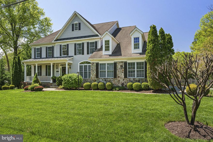 Beautiful stone and HardiPlank cul-de-sac home w/3-car side load garage and nearly 6,000 sq ft of living space on .4 acres. The main level, with 2-story foyer, and front and rear staircases, mixes traditional spaces with an open and inviting floorplan. Notable features include hardwood floors, tall ceilings, customized closets, crown molding and oversized windows - maximizing the natural light throughout. The gourmet eat-in kitchen, with direct entry from the garage and direct access to the spacious deck, has been transformed to include a large island with additional cabinets and breakfast bar, a 6-burner Wolf range and stainless French drawer refrigerator, tons of counter and cabinet space, under counter lighting, and space for a large table for casual meals. The kitchen flows through a butler’s pantry with wall cabinets and custom-organized pull-out pantry closets, to the spacious formal dining room. A cozy  family room with a gas fireplace and direct access to the deck through new pella doors, ties into the other side of the kitchen.  A cheerful and inspiring home office, formal living room and powder room complete this level. Upstairs, there are 4 bedrooms, including the primary suite with sitting area, a large walk-in closet with custom built-ins and spacious bathroom with second custom-built walk-in, private water closet, separate shower and soaking tub. The three secondary bedrooms include an ensuite and two bedrooms connected by a bathroom. The laundry room, with cabinets and utility sink, is also located on the bedroom level. The fully finished and expansive lower level has a large rec room with space for a pool table and other entertainment equipment, a large gym with mirrored walls, and a bonus room that can be used as a guest suite or home office with a walk-in closet and access to the dual-entry full bath. Enjoy an extension of living space outdoors with a spacious deck, a stone patio with outdoor fireplace and a fenced-in backyard. Close to major commuter routes. Public water and sewer. McLean High School pyramid.