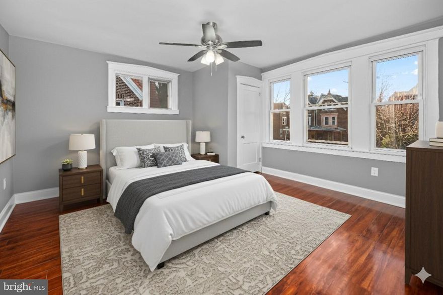 Move right in to this beautifully renovated 4-bedroom, 2.5-bath stone twin in the heart of Germantown! This classic home has been thoughtfully updated from top to bottom, offering modern comfort with timeless curb appeal. All-new systems, finishes, and fixtures provide peace of mind, while the charming stone exterior and welcoming front porch set the tone for what’s inside.

The sun-drenched, open-concept main level features gleaming hardwood floors and a cozy gas fireplace in the living room. The stylish new kitchen with modern cabinetry, sleek countertops, and stainless appliances flows seamlessly into the dining area—perfect for casual meals or lively gatherings. A convenient powder room completes the first floor.

Upstairs, you’ll find four generously sized bedrooms with ample closet space and a renovated full hall bath. The fully finished basement adds flexible living options, including a large family room or media space, laundry hookups, a full bathroom, and a private bedroom—ideal for guests, a home office, or extended family.

Additional highlights include central air, a beautiful staircase, and turnkey convenience—every inch of this home is fresh and move-in ready. Tucked on a quiet, tree-lined block with easy access to parks, public transportation, and local shops, this is the perfect blend of city living and neighborhood charm.