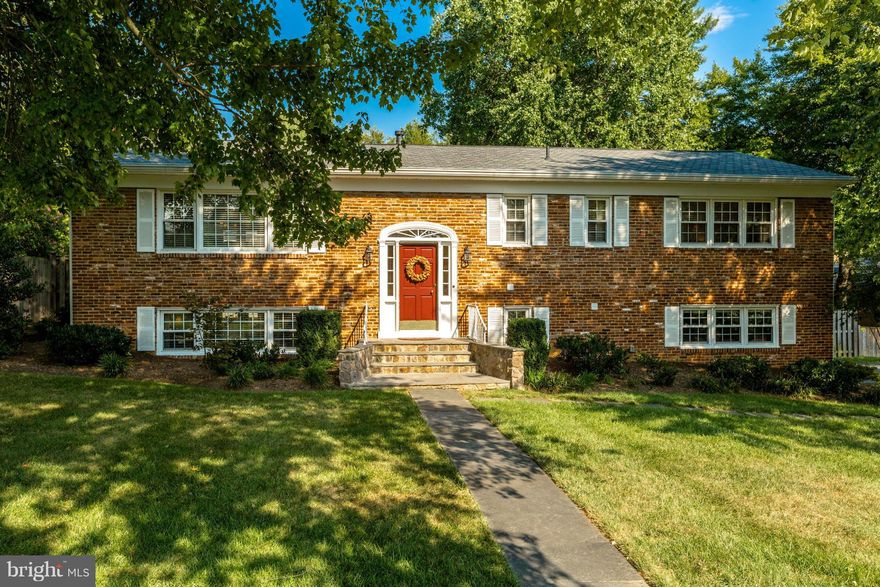 Completely Updated Light-filled Brick Colonial in Sought After McLean Hamlet! 5BR/3BA, Oversized 2 car garage, 1/3+ acre lot with fenced back yard!  Recent Improvements include New Baths, Roof, Windows, Electrical, New stone patio & more! Updated Kitchen w/ granite countertops & stainless appliances! Spacious Walkout LL. Steps from Spring Hill Rec Center & School!