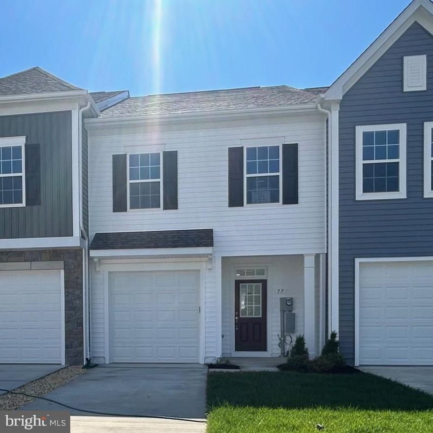 **OFFERING UP TO $10,000 IN CLOSING ASSISTANCE  FOR PRIMARY RESIDENCE WITH USE OF PREFERRED LENDER AND TITLE.**
IMMEDIATE DELIVERY, NOW IS THE TIME! LAST CHANCE TO BUY NEW AT McCAULEY CROSSING! Move in Ready! Beautiful 2 Level Garage Townhome with Open Concept Main Level! This spacious two-story Litchfield II townhome offers an attached 1-car garage, boxed oak stairs, beautiful luxury vinyl plank flooring throughout the entire first floor and 9 ft. ceilings. Upscale exterior curb appeal, alcove shelter front entry and a gracious foyer, leads you to the wide open family room and wonderful kitchen which features a huge island with large single bowl sink, Whirlpool stainless steel appliances, Quartz countertops and a big breakfast/dinner table area. The expansive primary suite features a sitting area and a generous walk-in closet. The luxurious primary bath features a dual sink vanity, step-in shower with tile bench has a classy thick glass frameless door, and private water closet. Two generous sized secondary bedrooms, another separate full bath and conveniently located laundry area complete the upper level. This is not your typical townhome and lots of additional options already added in at this price - Wow! Call Today!