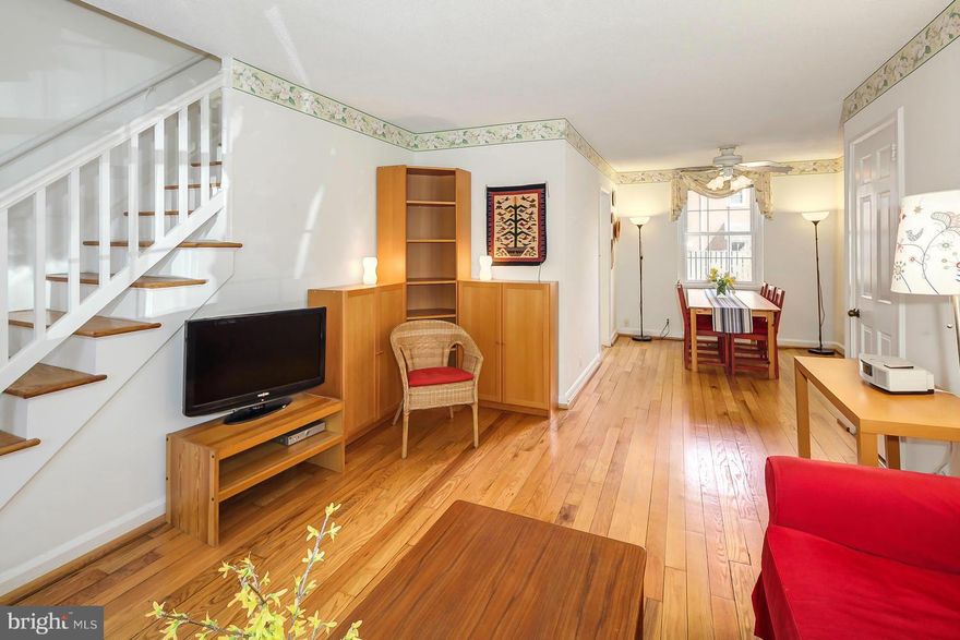 Rare, sought after 'Arlington' model townhouse, w/1st fl BR & BA. Vintage charm w/beautiful honey hardwood fl on main & upper lvls. Spacious fl plan, 3 BR w/additional den on LL, 3 full BA. Perfectly located home away fr traffic in quiet, park-like, neighborhood w/large trees & decorative plantings, large pool, tennis courts & playground. Seconds to shopping, dining, entertainment & more!!