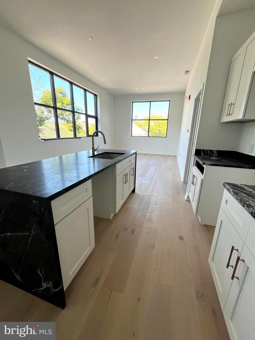 A brand new one-bedroom, one-bath apartment at The Lofts at Narberth Station offers an exceptional opportunity to enjoy luxury living in one of the Main Line’s most beloved communities. Located in a boutique building featuring just eight thoughtfully designed units, this residence is ideally situated directly across from the train station, providing unmatched convenience for daily commuting and easy access to Center City. Inside, the apartment features soaring ceilings and oversized windows that flood the space with natural light, creating an open and airy atmosphere. High-end finishes throughout include soapstone countertops, wide 6-inch modern hardwood flooring, stainless steel kitchen appliances, and an in-unit washer and dryer for everyday comfort.

The Lofts at Narberth Station are nestled in town, a highly walkable neighborhood just steps from everything you need—top-rated restaurants, coffee shops, salons, the state store, a dry cleaner, post office, movie theater, and a wide variety of specialty food markets and local retail shops. Community amenities such as parks, a playground, and the Narberth library are just around the corner, adding to the small-town charm that makes Narberth so appealing. Parking is available for an additional fee, and pets are welcome at the landlord’s discretion. The building also offers flexibility for shorter-term leases and features multiple floor plans to suit different needs. For more information about this apartment, upcoming availability, or details about the exciting revitalization planned for Narberth, please inquire.