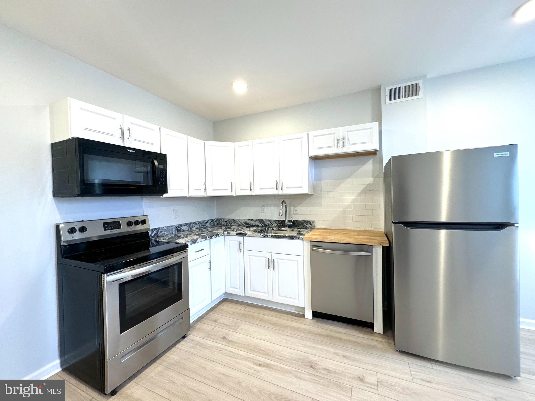 Welcome to 2406 W Thompson St #1 a beautifully updated 2-bedroom, 1-bath first-floor apartment in the heart of Brewerytown. This spacious unit features a remodeled kitchen with modern finishes, a bright open layout, and direct access to a large private yard perfect for relaxing or entertaining. Located on a quiet block with easy access to public transportation, restaurants, and local parks. Additional $35 flat fee for water. $25 monthly pet fee per pet, 2 pet limit