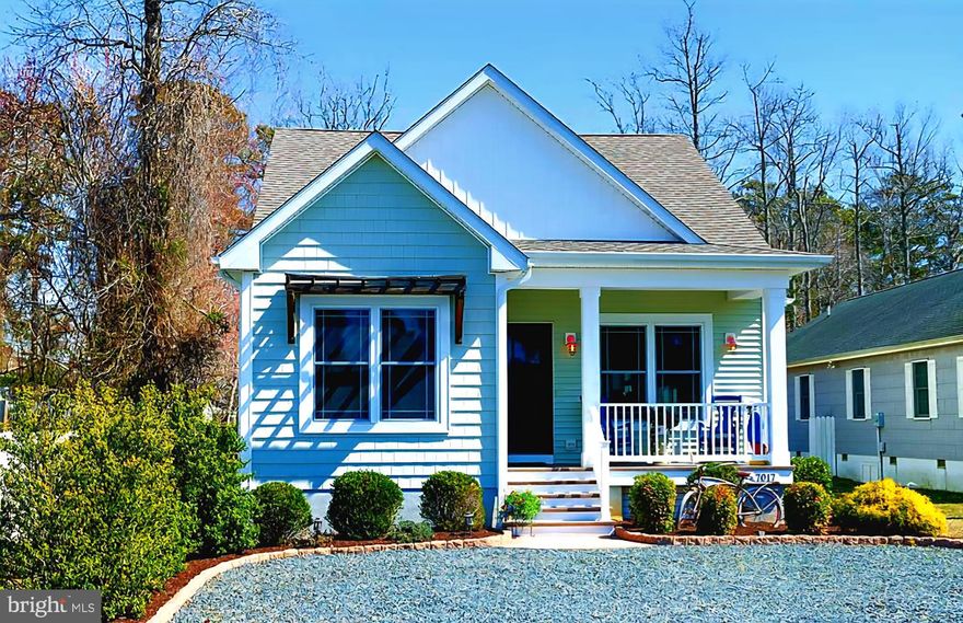 Phenomenally maintained 1.5 story beach cottage. 3BR 2BA with vaulted ceilings. Office/Den/Bonus Room setup on the second floor. 1st Floor Ensuite w/ Walk In Closet & Bath w/ tiled shower. Shiplap walls, SS Appliances. Quartz counters, Butcher block Kitchen Island. Luxury Vinyl Plank Flooring. Ceramic Tile in Baths. Nice Back Porch w/ large outdoor enclosed shower. Detached garage finished w/ epoxy floor. Fantastic Backyard Space w/Stonework & Lighting w/Hot Tub and Privacy Fence. Rennai Tankless Water Heater & Plenty of parking space for vehicles and boats. Located on Chincoteague Island in a great Beach Cottage Community just minutes from Assateague beaches, fishing and coastal living at its finest. Property can be accessed from two streets. A MUST SEE! Sold Unfurnished.