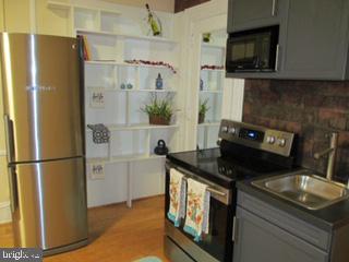 Welcome to this adorable, thoughtfully renovated studio in the Arts Condo. Right off the Avenue of the Arts, you are within walking distance of everything including the best restaurants the City has to offer. Unit was recently renovated and features hardwood flooring with state-of-the-art kitchen plus full size stove and fridge! There is also a beautiful marble bath, and with all utilities included. Central air and heat. 24 hour doorman. Fitness center. Community room and business area with Free WiFi. Make your appointment today.