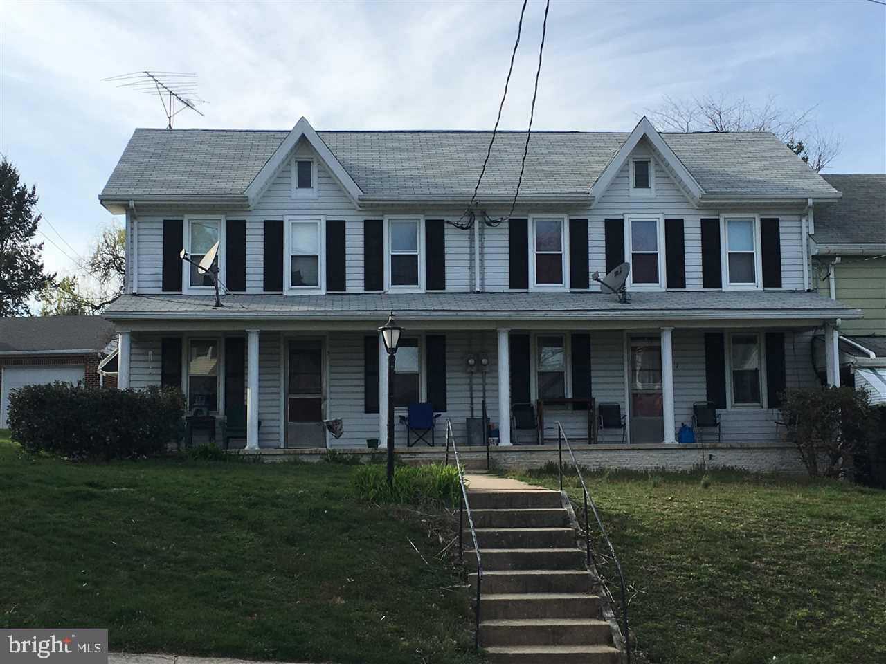 CHECK OUT THIS SPACIOUS 2-UNIT PROPERTY (currently both rented on month-to-month) - Each features 2 bedrooms, 1 1/2 baths, refrigerator, stove, separate utilities & laundry hookups. Nice front porches and back yards! New roof on both units in 2014! Wonderful opportunity for owner-occupied in a quaint town within easy commuting distance from York or Lancaster. Showings by appointments only.