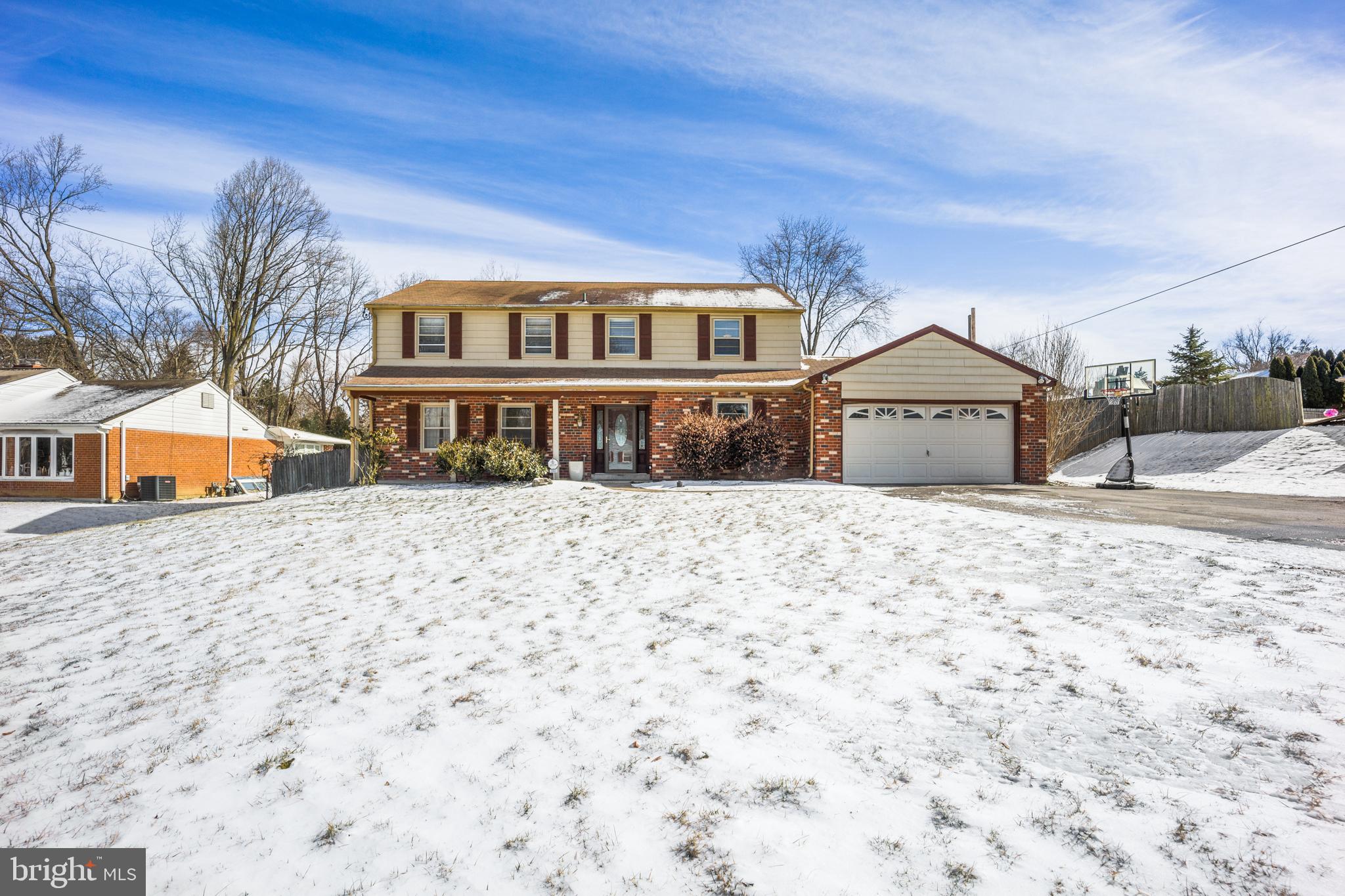 **OFFERS, IF ANY ARE DUE  SATURDAY, 3-19-22 BY 5PM** THIS is the property you have been waiting for! Welcome to 2003 Kerwood Drive, an incredible center hall colonial with endless potential in the prestigious Marple Newtown School District. Enter through your two car garage with access to inside, or enter through the front door into an elegant foyer with immaculate hardwood floors and vinyl plank flooring.  To your left is the formal living room, ideal for welcoming guests and with plenty of room for a baby grand piano  if entertaining. To your right is the dining room with a pass through door to the kitchen, complete with a built-in range, cook-top, and stainless appliances, ready for you to finish it with your tasteful upgrades. There is an "attached" island with seating for three, and a generously sized eat-in area as well. To your left there is access to the den with a brick fireplace, currently serving as an office, but that could also offer additional space for gathering, or possibly even a first floor bedroom. A powder room and conveniently situated laundry area are also on this side of the kitchen. To the right of is a marvelously crafted, heated sun room with high ceilings, a large overhead fan, shiplap accent wall,  gas fireplace, and built-in, custom, Blue Bahia granite wet bar--WOW! Proceed upstairs to find three large bedrooms with a full hall bath, and pulldown access to the attic with convenient flooring for additional storage. The master is vast with plenty of closet space, and a tastefully done, modern, master bathroom comprised of high end materials. Proceed down to the lower level where you will find a fully finished basement (currently doubling as a bedroom for a teenager), dry and ready for your imagination to take over. A movie theater, home gym, office, or even a fifth bedroom.  Directly off the sunroom is the exit to the rear of the property. Verdant with vegetation in the summer, the backyard sprawls over most of the expansive  116' x 260' private lot with a beautiful patio, extensive hardscaping, and  of course, your own personal in-ground pool, for the ultimate summer entertaining oasis.  All this comes nestled in the best part of Broomall, conveniently located with access to shopping, entertainment, and arterial highways. To top it off, the sellers are offering a 1-Year American Home Shield warranty to allay any concerns your buyers may have. Some furniture is negotiable, there will be no open houses on this property.  Properties on a piece of land like this, with low taxes and an in-ground pool don't come along often, book your showing TODAY before it's gone!
