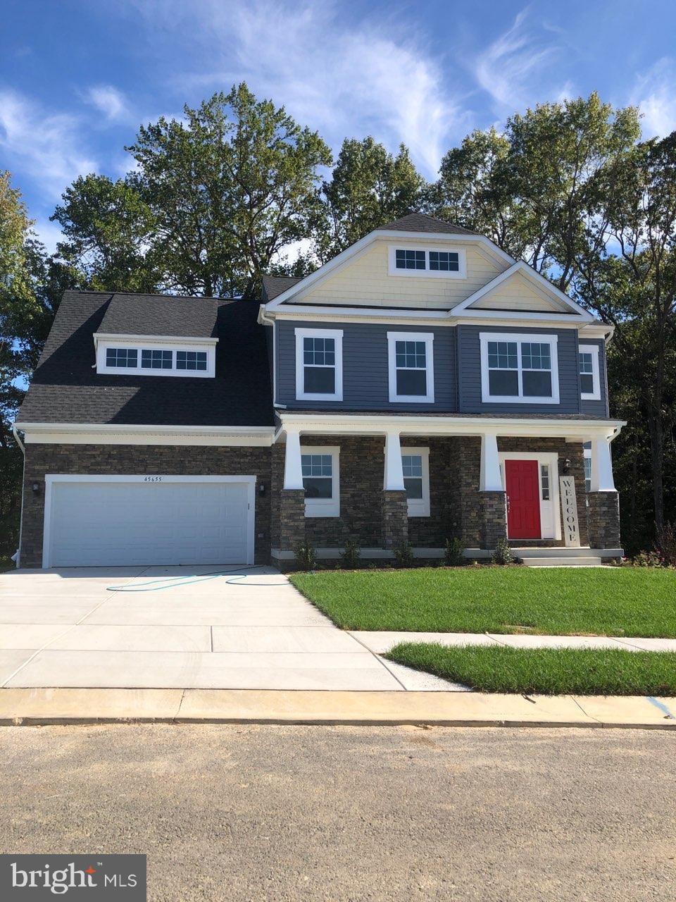 Sold & Settled Elizabeth #3 floorplan at Elizabeth Hills. This home features a stone front as shown, as well as a finished basement rec room and bath. Upgrades such as granite kitchen counters, stainless steel appliances and Oak staircase. Walk out basement on site backing to woods.
