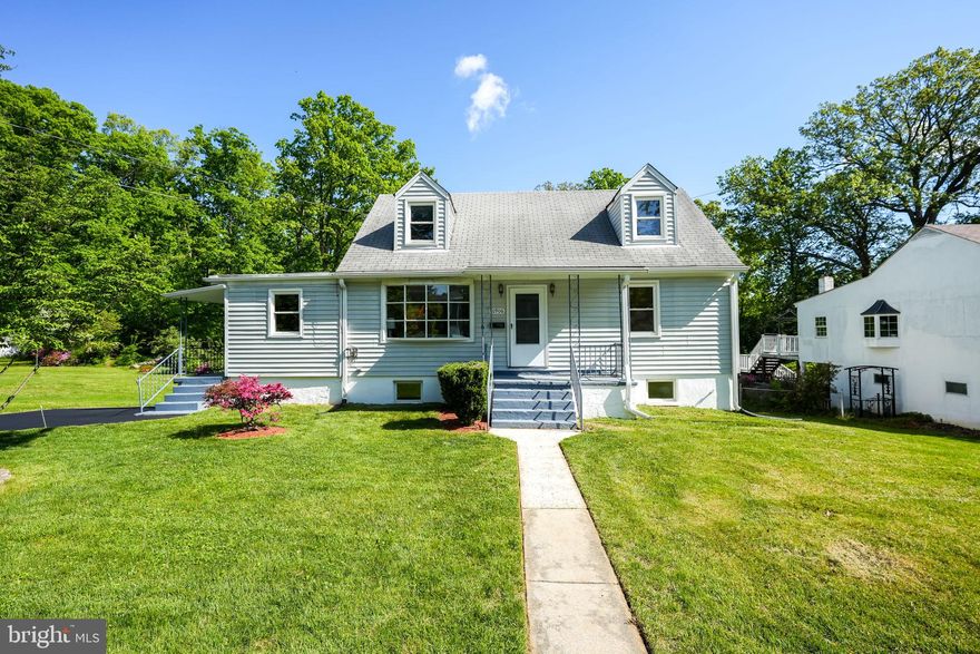 Let the allure of this historic and charming 1950s Cape Cod draw you in from first breath.  Original hardwoods in spectacular condition have been newly refinished and antiquated touches of Americana throughout. An antique light fixture here, a retro switch plate there; wood paneling, a golden era entertainment den in the lower level complete with built-in dry bar and fun, linoleum laundry room tiles.  Just minutes from downtown Fairfax City, on a large and deep lot with privacy and so much potential!  Add a garage, an addition or a pool your dreams are your only limits! No HOA and the quaint and charming streets of Fairfax Woods. 
New ceramic tile floor in the kitchen, fresh countertop, new dishwasher. Main level offers two bedrooms and a full bathroom. Dining room or sunroom addition with bay window and views of the lush garden. Freshly painted top to bottom, new carpeting, door hardware, plumbing fixtures and lighting. Hardwood staircase leads to the upper level featuring a second full bathroom and two generous-sized bedrooms with character and unique touches. Expansive deck overlooks the sprawling lawn. Storage shed for all your tools and toys. Retro staircase down to the renovated lower level rec room with office space or room to create anything your heart desires.  Laundry room and storage area & separate, secure storage room with outside entrance under the deck. Long, private driveway to the rear of the home with covered parking. 
Minutes to I-66 & routes 50/29/236 & 123, close to Vienna Metro and less than a mile to Warwick Ave Metro bus stop. Fair Oaks Mall, shopping, restaurants, and all conveniences are within arm’s reach. Don’t miss this unique opportunity to own a gorgeous, authentically charming Cape Cod on an extraordinary lot!! You won’t find this again!