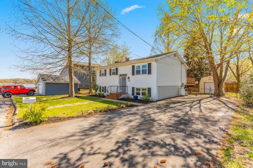 Water View Living with Private Marina Access & Walk to Beaches!

Welcome to this beautifully maintained 3-bedroom, 2-bath home offering scenic water views and an incredible coastal lifestyle. The spacious kitchen is perfect for entertaining, while the fully finished basement provides flexible living space for a family room, home office, or recreation area.

Step outside to your fully fenced yard and enjoy peaceful mornings or evening gatherings on the deck overlooking the water. Take advantage of your own private marina with a boat slip, allowing you to dock your boat just steps away and in full view from your deck, all for a minimal annual fee.

This home also features new siding, roof, numerous updated windows, and a double driveway with space for up to four vehicles. Inside, you’ll find beautiful real hardwood floors that add warmth and character throughout.

Located within walking distance to local beaches, this home offers the perfect blend of relaxation, convenience, and water-oriented living. This is a MUST SEE, will not last long.