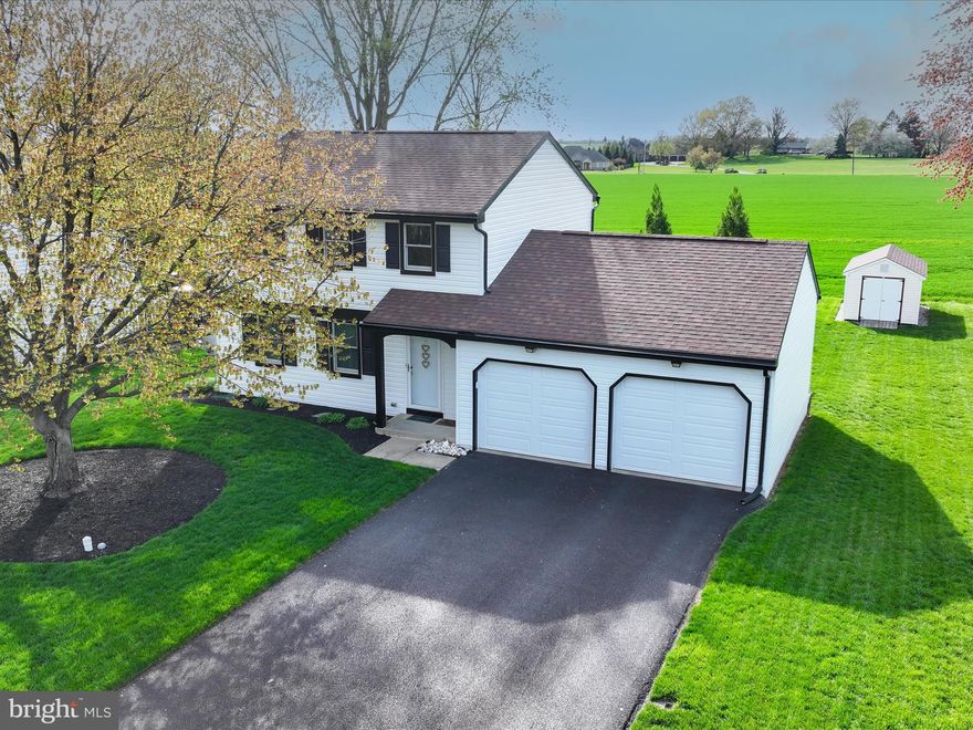 Charming Landisville Gem in Westfield! Welcome to this sweet Landisville home, ideally located close to schools and with quick access to Route 283—perfect for travel and commuting. Nestled in the desirable Westfield neighborhood, it’s the kind of place where family strolls and bike rides are part of daily life. Step inside to a spacious first floor featuring a large living room and an open dining/kitchen layout designed for modern living. The beautifully updated kitchen is sure to impress with quartz countertops, a breakfast bar, farmhouse sink, recessed lighting, stainless steel appliances, a pantry, and custom cabinetry. A super convenient and stylishly updated main-level half bath and laundry area add to the functionality of this well-designed home. Upstairs, you’ll find three generously sized bedrooms and a fully remodeled full bath, offering comfort and style for the whole family. The fully finished lower level expands your living space with a cozy propane stove—perfect for chilly winter nights—and offers ample storage as well. Enjoy outdoor living on the 16' x 15' composite deck, complete with a retractable awning. This peaceful retreat overlooks a spacious yard with plenty of room for play, gardening, or simply relaxing while taking in the preserved farmland views and stunning evening sunsets. Additional features include an oversized two-car garage with built-in shelving and pegboard, a shed for extra storage, and thoughtful upgrades throughout: New roof (2017), Heat pump & A/C (2021), Ultraviolet air treatment system, All new siding & spouting (2023), Radon mitigation system, Outdoor sump pump, annual inspections of electric, plumbing, and HVAC systems. This home has been maintained with sheer excellence and attention to detail - don’t miss your chance to make it yours!