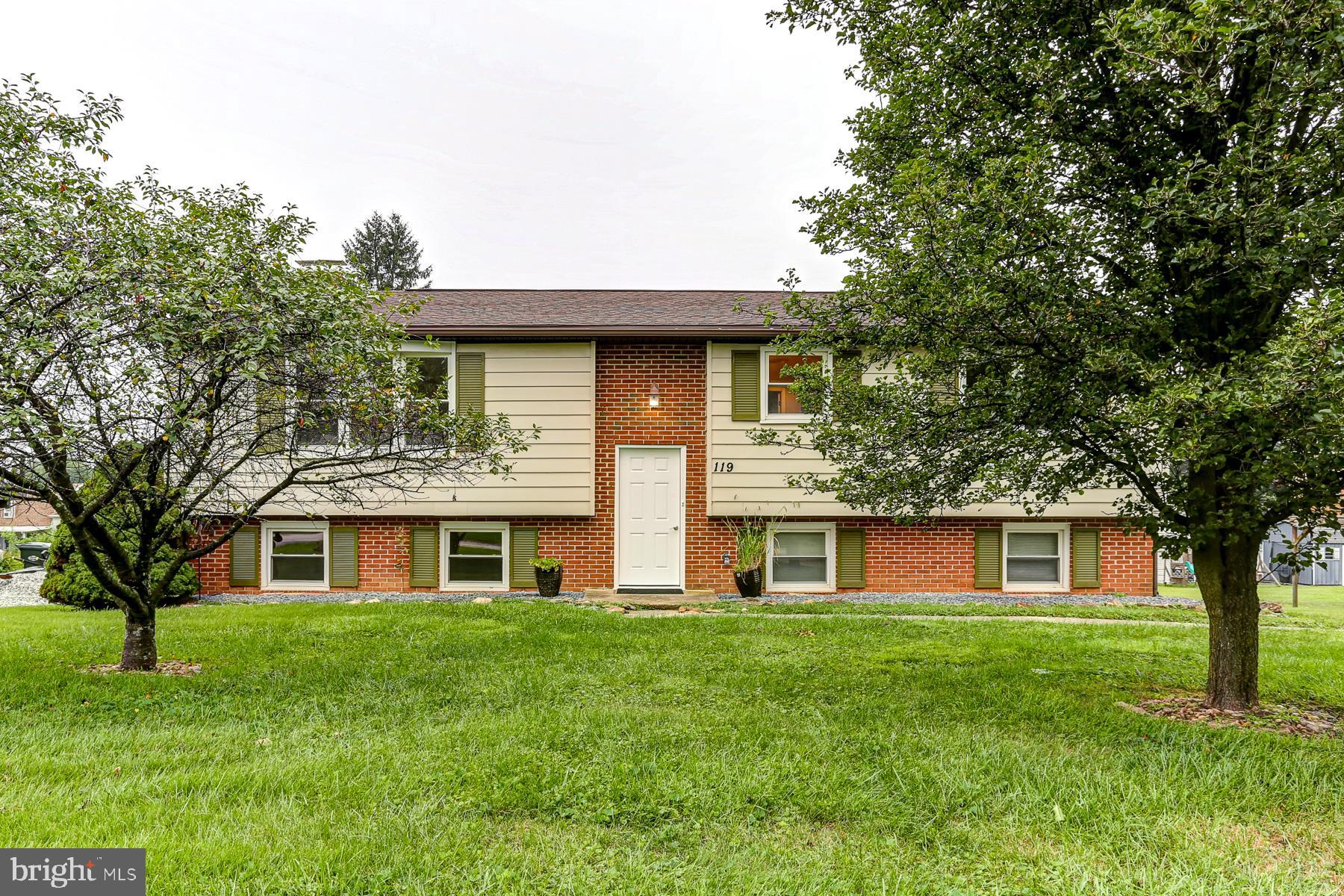 Beautifully remodeled and refreshed 3 BR / 1.5 BA home located in a great neighborhood in Red Lion! This home has gone through a fresh remodel with an updated kitchen including new quartz countertops and tile backsplash, as well as new flooring, fresh paint, and new plumbing/lighting fixtures. The main floor has 3 ample sized bedrooms with a full bath, kitchen/dining area, as well as a living room. The finished lower level has a large family room with a wood fireplace, half bath, and laundry/mechanical room. Other features of this home include natural gas heat, central air, new back patio door with refinished deck and a private fenced in backyard. This home offers a private/flat backyard with a 2 car rear entry garage offering plenty of storage. Come and see this home today!