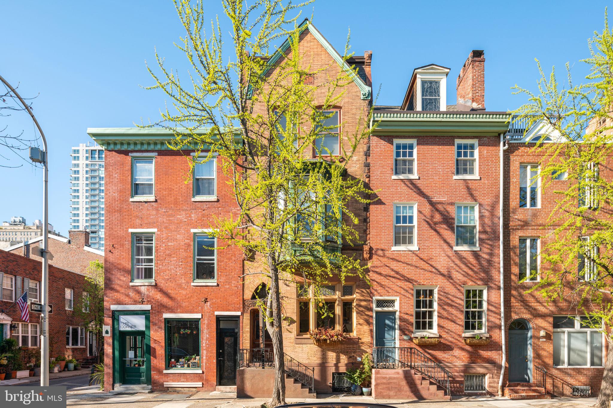 A magnificent home, Gorgeously Restored & Renovated in 2019-2020. Stunning Character and Detail. 4 bedroom plus large family room, 3.5 bath pristine home in desirable Rittenhouse location. Finished Lower Level. Private rear yard. Roof deck with hot tub and straight-on skyline views. 2-car, self-park, covered GARAGE Parking at the Symphony House (Seller Paid for 1 year, or 2 years for 1 car). Gorgeous Roman brick and copper bay facade. This south facing home with bright sunlight throughout offers spacious rooms, original hardwood floors throughout, 10'+ ceilings on every floor, leaded glass throughout, significant woodwork throughout, Mercer Tiled mantles, and more. So Much Character. 3-zone HVAC. New electrical wiring (all knob & tube removed), new plumbing, new kitchen (moved from 2nd floor to 1st), new master suite, newly finished lower level. Blending grand, sophisticated details with modern design, this is an important home in a super convenient location (99 WalkScore, 100 TransitScore). 3 blocks to Rittenhouse Square and convenient to all that Center City has to offer, all universities and hospitals, parks, shopping, restaurants, coffee shops, and more. Located in the Greenfield School Catchment. One Special feature of 1611 Pine's location is that its rear yard has direct access to the 300 block of South Smedley Street, which is one of the city's nicest and most neighborly blocks (play, ride bikes, etc.).