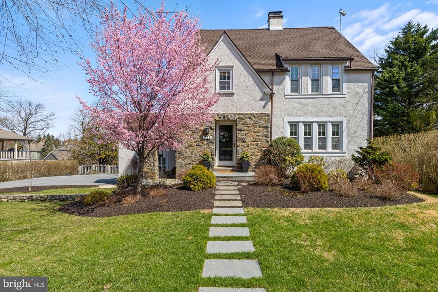 Ideally located just moments from the heart of Wayne, this beautifully updated 4-5 bedroom 3.5 bathroom, turnkey home blends timeless charm with modern convenience. Enjoy effortless access to boutique shopping, top-rated restaurants, the train, parks, and the Radnor Trail—all just a short distance from your front door.

Set on a flat, fenced-in lot, the property features a spacious backyard complete with a deck and patio—perfect for outdoor entertaining and everyday enjoyment.

From the moment you arrive, the home’s classic curb appeal and inviting character make a lasting impression. Inside, a thoughtfully updated interior showcases hardwood floors, elegant architectural details, and sun-filled living spaces designed for today’s lifestyle. The seamless layout offers an ideal balance for both comfortable living and entertaining.

The beautifully renovated kitchen serves as the heart of the home, featuring modern finishes, stainless steel appliances including a Wolf range and steam oven, with direct access to indoor and outdoor gathering spaces. Multiple living areas provide flexibility for a family room, home office, or playroom, while the sunroom adds a bright and cheerful retreat.

Upstairs, the bedrooms offer comfort and privacy, including an ensuite with a sitting room currently used as a home gym. A fully finished third floor provides additional versatile space for guests, work, or a potential primary suite as it has its own full bathroom.

Additional highlights include two garages and off-street parking for up to five cars.

With its prime location, classic charm, and extensive updates, this home offers the perfect combination of character, convenience, and move-in ready living—all within the award-winning Radnor School District.