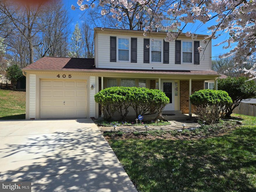 Welcome in! Cozy, lovingly maintained 3 bedroom and 2 1/2 bath colonial in cul-de-sac. Renovated kitchen cabinets with granite countertops. Updated roof (2018), HVAC. Hardwood floors on the main level. Plenty of parking in the redone driveway (2021) with an attached roomy 1-car garage. New sliding door opens onto a spacious deck. A sizeable shed/storage located in backyard. Conveniently located near ICC.