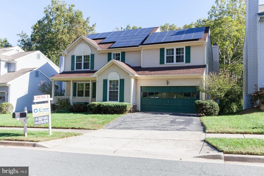 This house has all. 5BR/3.5BH/2 car. Masterfully newly renovated: New HW floors (1st fl & basement), New carpet(2nd fl), New paint thruout. Upgrade kitchen w/New cabinets, countertops & appliance. Upgrade bathrooms w/New sinks, countertops, tubs and shower. Windows & Roof only 4 yrs. A/C less then1yr. Solar energy. Walk-out basement w/ recreation rm & 5th bdrm w/full BH. Bright & Backing to woods.