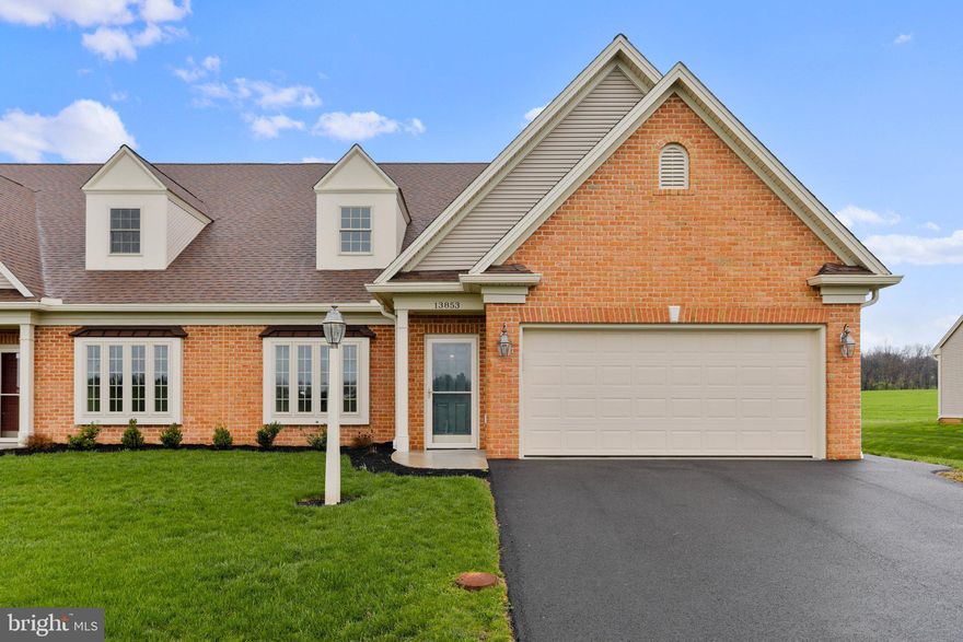 Another gorgeous custom built home by Mt. Tabor Builders, Inc. Welcome home to 13853 Ideal Circle located in sought after Paradise Heights neighborhood in the north end of Hagerstown. Low monthly HOA takes care of snow removal and lawn maintenance including tree and shrubbery trimming. No city taxes. With almost 3,000 sq. ft. of beautiful living space, this new construction, upscale villa, is care-free living at its absolute best.  Stunning gourmet kitchen includes granite counter tops, soft-close drawers, engineered hard wood flooring, and slate/smudge free stainless steel appliances. The huge kitchen offers plenty of cabinet and workable counter space plus a large island with easily enough space for several bar/breakfast stools. The spacious, open living room is perfect for entertaining friends and family and comes complete with a gas fireplace and is already equipped for your large screen TV above the mantal. Large bow window allows for an abundance of natural light and views of fields and pastures.  Built in computer/office area with granite top and abundant built-in shelving is ideal for working from home. Separate large laundry room includes full size front loading washer and dryer, wash sink, and large closet. Primary bedroom has huge walk in closet and private bathroom suite with marble double bowl sinks, and walk-in ceramic tiled shower stall. Both main level bedrooms have walk out to large patio with gorgeous pastoral, peaceful and quiet views. Finished second floor has family/large gathering room, third bedroom, full bathroom, and a bonus room that has endless possibilities: game room, play room, exercise room, or an additional bedroom. The second floor also features a very spacious separate storage area plus additional attic storage space with easy pull down stairs. The truly oversized attached two car garage has plenty of room for larger vehicles and still room to spare for storage and also has convenient separate side entrance. Dual-zoned HVAC systems for each floor and efficient gas heat. All of your dream boxes will be checked off! This home is completely move in ready with a 1-year builder warranty included beginning the day of closing. Very commuter friendly location within minutes to I-70, I-81, and Hagerstown Regional Airport. Close proximity to downtown Hagerstown and the historic Maryland Theatre, fine dining, and shopping. Beautiful Cunningham Falls, historic Antietam Battlefield, and scenic C&O Canal are just a quick and easy drive away. The PA & WV state lines are within minutes away. There is truly nothing to do but move right in and begin enjoying the easy life. Schedule your showing today before it's gone!