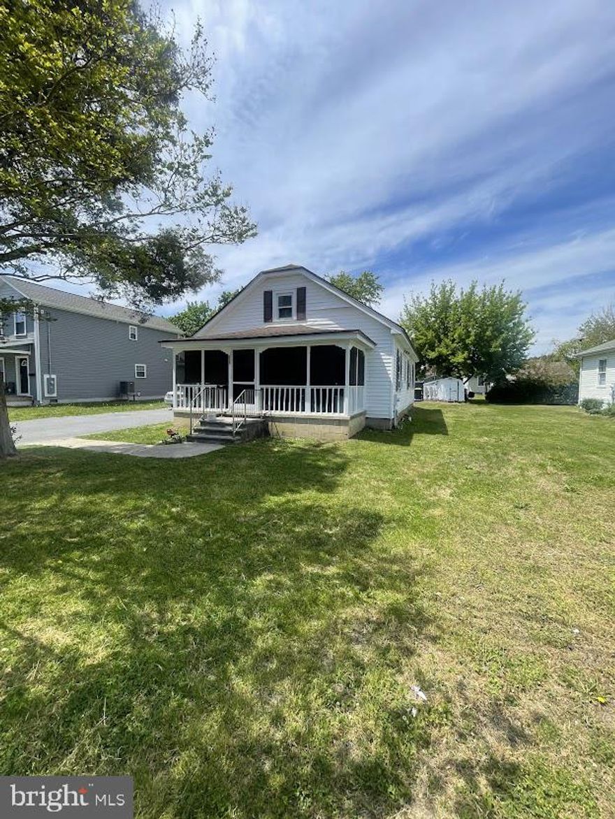 Welcome to 305 Rosa Street in Georgetown, DE! This 3-bedroom, 1-bath home offers charm and comfort with original hardwood floors throughout main living areas.  Enjoy additional living space in the spacious screened-in porch—perfect for relaxing or entertaining. Conveniently located with easy access to Delaware beaches, shopping, and dining. Home being sold AS-IS. All inspections are for informational purposes ONLY. Schedule your tour today!