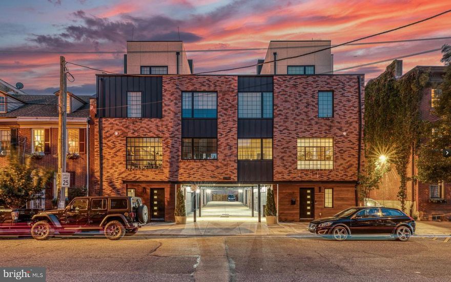 Coming Soon in Fishtown's highly regarded Shack8 townhome community --1130 Shackamaxon #3. Enjoy elevated finishes, a secure private two-car garage, two outdoor spaces, open and airy floor plans, +2.5 years remaining on the full tax abatement — all while steps from Frankford Avenue’s commercial corridor with renowned dining, shopping, and vibrant nightlife. Tucked away and set back from the main road, this home offers a rare blend of privacy and tranquility while remaining in the heart of the action. An oversized drive aisle leads to the private garage (18.9' W x 17.7' D) — big enough to house two SUVs. Inside, you’ll find a thoughtfully designed Spogue kitchen design complete with a Bosch appliance package including dual ovens, an oversized island, custom engineered hardwood floors, Lutron adjustable overhead lights, and custom window treatments by Allure Windows. A dedicated gas line allows for direct grill hookup, making outdoor cooking effortless. Notable after-market upgrades include the Brazilian ipe wood rooftop deck, custom millwork bookshelf/entertainment system, and an EV car charge hookup. This is luxury living defined by comfort, quality, and exceptional value — all in the heart of Fishtown. Inquire within for details regarding the existing VA loan terms where certain eligible borrowers could qualify for an assumption, subject to lender approval.