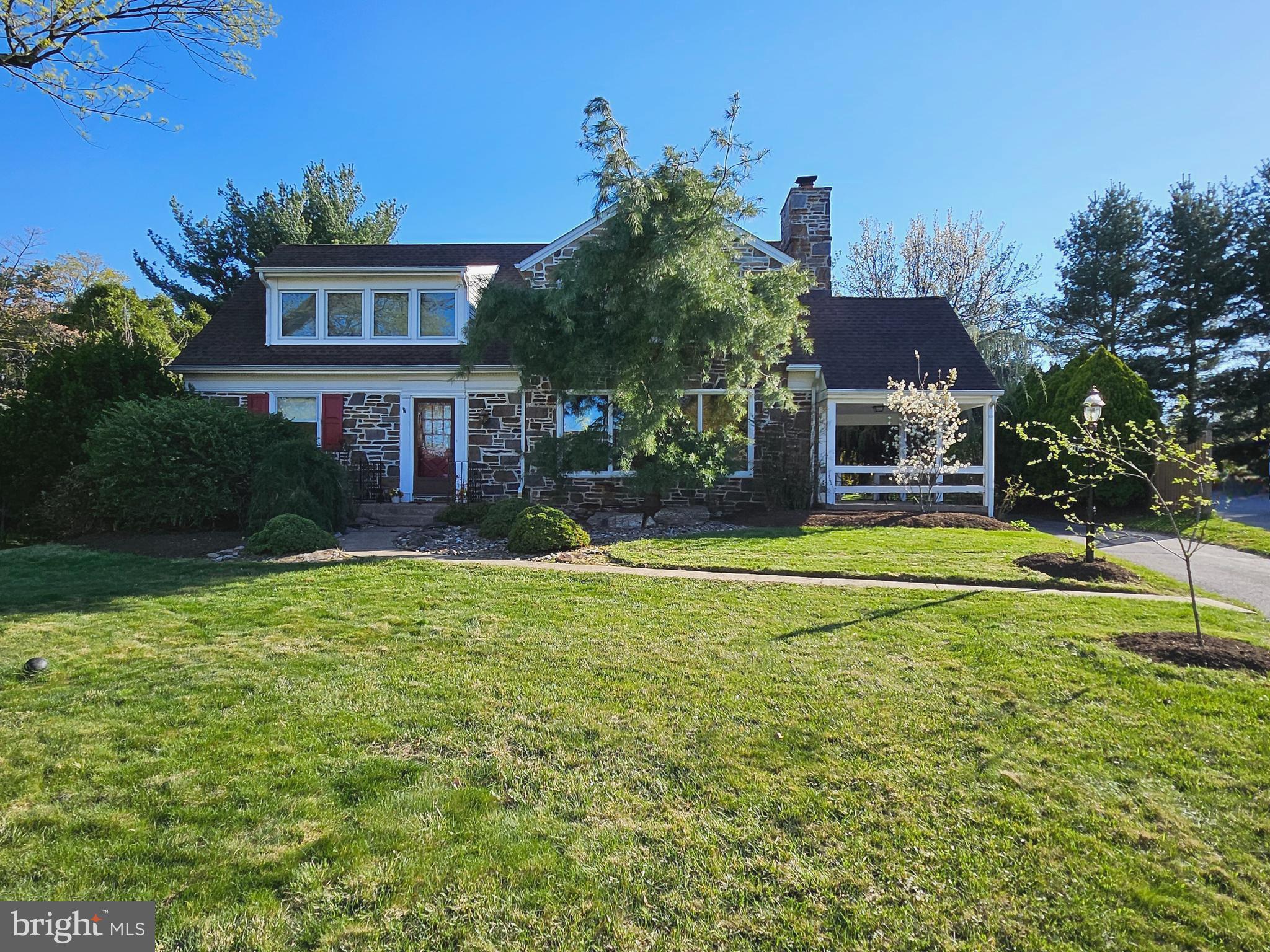 Located in the sought-after Shortridge community of Lower Merion, this stunning home, built in 1955 w/thoughtful additions in 1990 & 2011, seamlessly blends classic design w/contemporary amenities. Designed by renowned architect Patrick McGranaghan in 2011, 2nd floor was entirely reconstructed from floorboards up. Stone from the same quarry as 1st floor was used to create a matching stone façade. Deep front yard adds to the curb appeal.
Original main floor w/living rm, dining rm, 2 bedrooms & 2 bathrooms. One of the bedrms, formerly the primary, includes an en-suite bath w/separate shower enclosure & bathtub & atrium french door to patio. Living rm features wood-burning fireplace, built-in shelving w/lighting, & a large picture window w/deep windowsill that soaks the room in natural light. Living rm exits to a quaint side porch. Formal dining rm also has large picture window for more natural light. Powder rm is located off main hallway.
Great Rm addition 1990 boasts an updated kitchen w/antique beams, Hanssem cabinetry, granite countertops, Bosch fridge & freezer, Thermador double wall ovens & cooktop, wine fridge, Bosch dishwasher, & Sharp drawer microwave. Granite countertops offer ample space & a large island w/seating. Sink overlooks back patio, & a command center workspace adds to the function utility.
Spacious walk-in pantry closet easily accessed from kitchen. Great rm opens seamlessly to this chef’s kitchen, & skylights allow more natural light. Vaulted ceiling adds to the impressive look, while a gas fireplace w/a handsome hearth & mantle makes this space warm & cozy. Beautiful wooden beams set between skylights were reclaimed from Amish farmhouse. Wonderful space for entertaining, especially w/2 doorways outside. One set of french, double doors leads outside to slate patio, & another door exits to the backyard, creating an ideal flow for large parties. Great rm also includes floor outlets.
Custom back patio steps down gently from great rm to ground level. Constructed w/attractive slate, there’s plenty of space for table & chairs, grilling, & still more rm for additional seating, high-top tables, flower pots, or room to mingle. Backyard features 2 raised garden beds, a stone raised bed, & a variety of carefully selected trees & bushes. Mature trees & tall fencing provide privacy. Grounds have much to offer those who enjoy gardening or just being outside.
2nd floor w/intelligent architecture & design includes another skylight in the hallway. Primary suite features 2 walk-in closets & a luxurious bathroom w/Ronbow cabinetry, Grohe faucets, bidet & natural stone shower. Hall bat features enameled bathtub, Kohler faucets, Ronbow cabinetry, & marble thresholds. 2 additional bedrms are spacious & bright. Rear bedrm includes mini-split AC system for optimal comfort. Bamboo flooring is found throughout 2nd floor.
Finished basement for more living space & storage space. Built-in bookshelves & surround sound speakers, recessed lighting, & laminate flooring in keeping w/the home’s style. Double doors to the laundry rm w/accesses to crawl space storage. Door from basement provides access to the rear load 2car garage. Garage also enters to kitchen across the hall from walk-in pantry.
State-of-the-art HVAC system upgraded 2008 w/2 compressors for efficiency & extra cooling capacity. Tankless hot water system 2019 ensures ample hot water for the whole household. Additional features include whole-house insulation, soundproofing between 2nd-floor walls, & network cabling all floors. Also wired w/an external electrical plug where a portable generator can be connected to power kitchen refrigerator & freezer, heater, sump pump, & hot water. Located w/easy access to shopping, dining, & the Paoli-Thorndale Septa Train Line just minutes away. This meticulously maintained home offers a unique blend of comfort, style, & modern convenience!