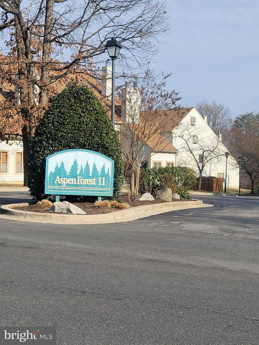 Wonderful 2 Bedroom, 2 Bathroom END UNIT Condo with a GARAGE!   Condo located at the end of a quiet cul -de -sac. Beautiful hardwood floors throughout the unit along with vaulted ceilings and a skylight.  Kitchen has a garden window allowing for lots of sunlight and there's plenty of counter and cabinet space.  Relax or entertain around the fireplace.  Spacious bedrooms, both with walk-in closets. Main bedroom with a full bathroom and its' own balcony...great for a relaxing breakfast or to unwind in the evening.  You will be close to shopping, parks, I-495, I-95, and the ICC.  Home has had several updates  HVAC, hot water heater, windows, and flooring, all recently replaced. Check out the virtual tour link, and schedule your private tour today!!