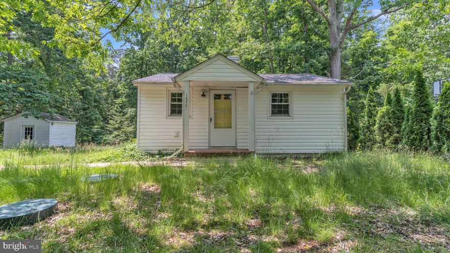 This charming 2 bedroom, 1 bathroom home is move-in ready with recently replaced laminate wood flooring, an open concept kitchen and dining space and a washer and dryer. The kitchen has all the appliances you need to make meal planning a breeze. There is a mudroom leading out to the spacious backyard and shed area and is conveniently located near the Pax River Naval Base. The large lot has great potential for adding outdoor dining or entertaining space and is nestled near mature trees, creating a serene and private environment.The home could also be a great investment opportunity for a quick flip! Schedule your showing today!