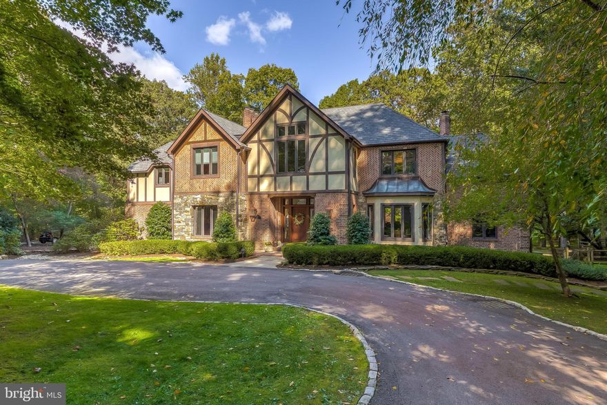 Prepare to be wowed!  Set against the backdrop of Oregon Ridge Park, this  casually elegant  home has been thoughtfully updated and impeccably maintained.   Cooks' kitchen includes gas cooking, bar area with ice maker & beverage drawers and adjoining family room.  Flexible main level floor plan offers multiple office options and/or guest/au pair space along with a separate laundry room, living and dining rooms.  Up the curved main stairs, you'll discover a spacious master suite with luxurious renovated bath, walk-in closet, dressing room and wood-burning fireplace.  Rounding out the second floor are  4 additional bedrooms, 2 additional baths and 2nd floor family room, which offers  a multi-generational suite opportunity easily accessed by the back stairs. The finished above-grade basement with radiant heat floors provides flexible space for lounging, working out and hobbies as well as a kitchenette , bath and access to the pool and fenced backyard. Exterior features include a large, heated salt water pool (fully renovated 2016), IPE deck , 50 year roof, copper gutters and seating area with gas fireplace.  Car enthusiasts will delight in the 4 bay garage, one including a lift, equipped with  220 volt blower fan heaters. Zoned high efficiency HVAC, cell foam insulation and whole house generator keep the living easy.  Inviting and sophisticated, 44 Springhill Court has it all!