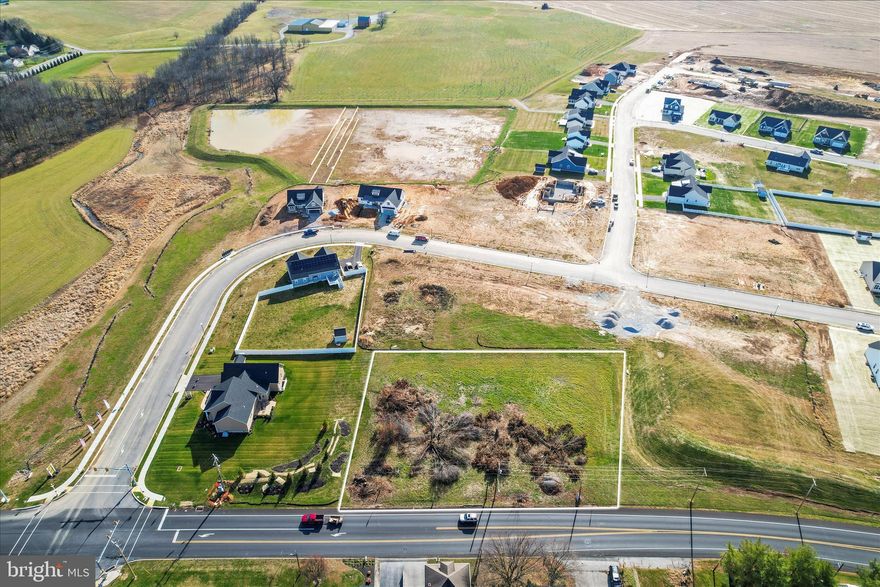 Discover the potential of this conveniently located 1.06-acre lot at 5955 Hanover Road in Hanover, PA. This flat, usable parcel offers a true blank canvas for a Single Family home.  Public water, sewer, natural gas, and electric are available at the property, and a private well is also onsite. Enjoy the convenience of being just a quarter mile from local shopping, including a grocery store and sub shop, and only a short drive to Gettysburg or the Maryland line. An ideal location with exceptional possibilities! Zoned R1 Residential