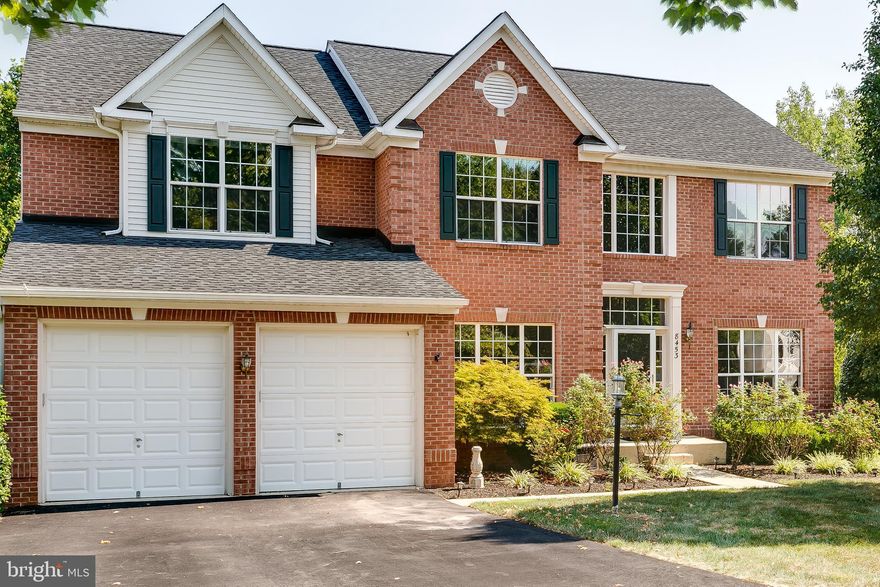 This is it, your 5 bedroom, 4.5 bath, 3 level home awaits! All the bedrooms are on the top floor and each room is freshly painted. As you head downstairs, there is a dual staircase so you can choose to enter into the foyer that leads to the dining room and upgraded library room with built-ins or you can enter into the living room with fireplace and gourmet kitchen area. Enjoy your office on the main level with french doors for privacy. Making your way into the basement you will see the many possibilities this finished basement can have. An entertainment center has been installed and a full bathroom. You will see the details of this home shows and the many upgrades including, two new AC units, new roof, new hardwood floors and many more. Come check it out and get ready to call it yours!