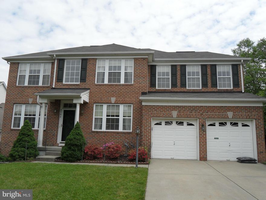 Back on the market. Move in anytime. Beautiful brick front colonial house that is located at Cul-de-sac. Great for big family w/ in -laws. Gourmet kitchen, new cook top, Granite counter, and all updated SS appliance. Hardwood floor for 1st and 2nd floor. Awesome looking basement with 2 rooms and full bathroom. Easy access to Route 29,95,695.