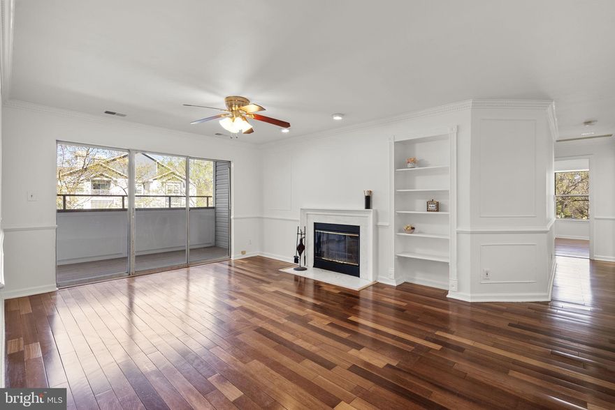 Call  your Agent for the BEST VALUE in the community to  see this natural light filled condo in Silver Spring! Nestled in the Vineyards community, this inviting residence has nearby parks, just right for relaxing strolls and enjoying the outdoors or joining activities at the community center.
Step inside to an abundance of natural light that fills every corner of the home,  wood floors that flow seamlessly throughout. The bright and airy living room is centered around a cozy wood burning fireplace, creating the perfect space to unwind in the evenings.
The kitchen is thoughtfully designed to overlook the living area. It features a convenient serving bar and a dedicated dining area. 
Enjoy your morning  or evening breeze on the brand-new balcony, which also includes an additional storage closet, perfect for bikes, outdoor seating, or seasonal items.
This condo offers two generously sized bedrooms. The primary suite features a full bathroom and a spacious walk-in closet.
Additional highlights include two reserved parking passes and plenty of guest parking. Residents enjoy access to a community swimming pool, fitness center, and clubhouse .
Conveniently located near major highways (I-95, Route 29, and Route 200), as well as hospitals, schools, community centers, Metro access, park-and-ride options, and a wide variety of dining and shopping destinations.
Water is included in the condo fee.