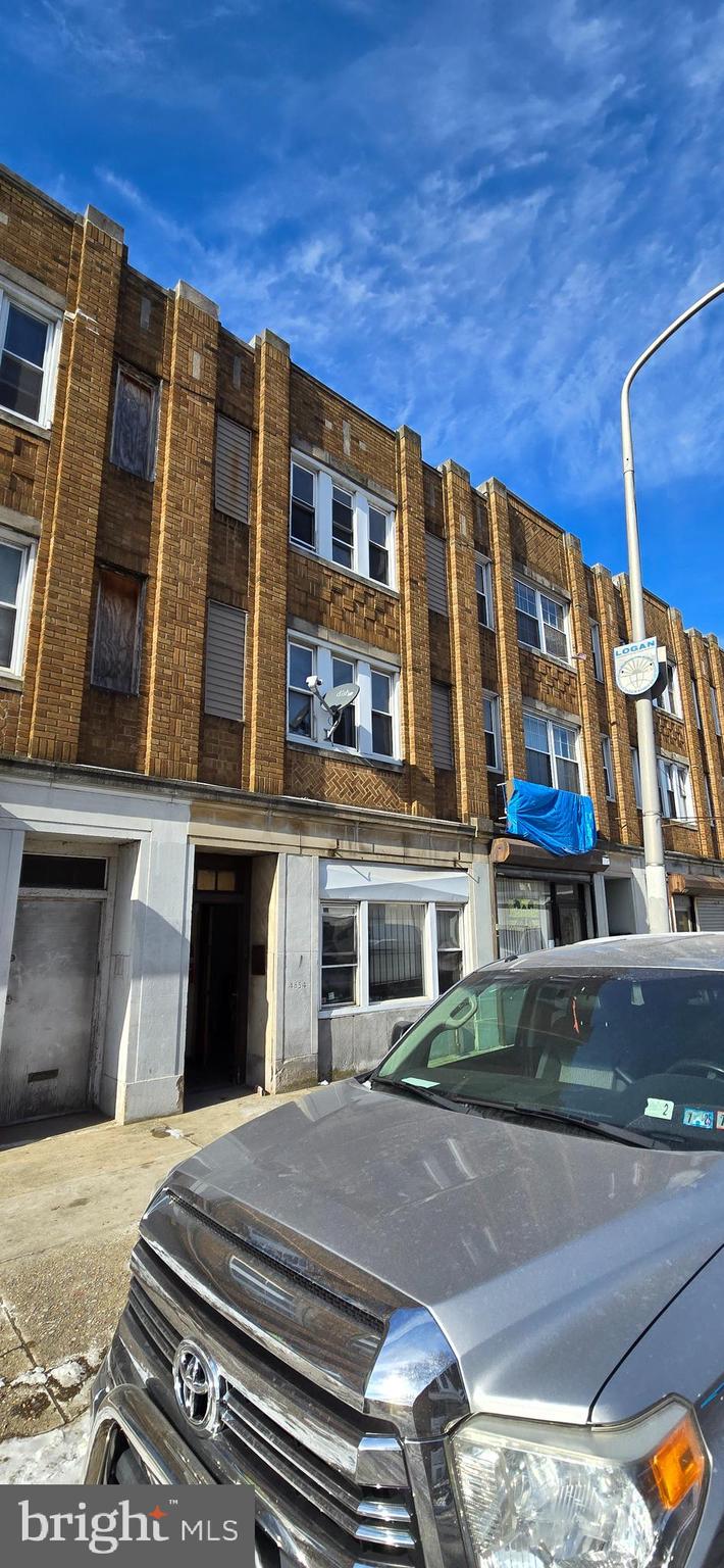 Attention Investors! This mixed-use property is located in the heart of Logan's Old York Rd business district. Featuring a commercial space on the ground level that houses a kitchenette, bathroom, and additional rooms. Both the second and 3rd floors feature 2-bed 1 bathroom units. The property requires repairs to be occupied, but presents a great opportunity for multiple streams of income. Currently it is being sold as is with the seller making no repairs or warranty of the condition.