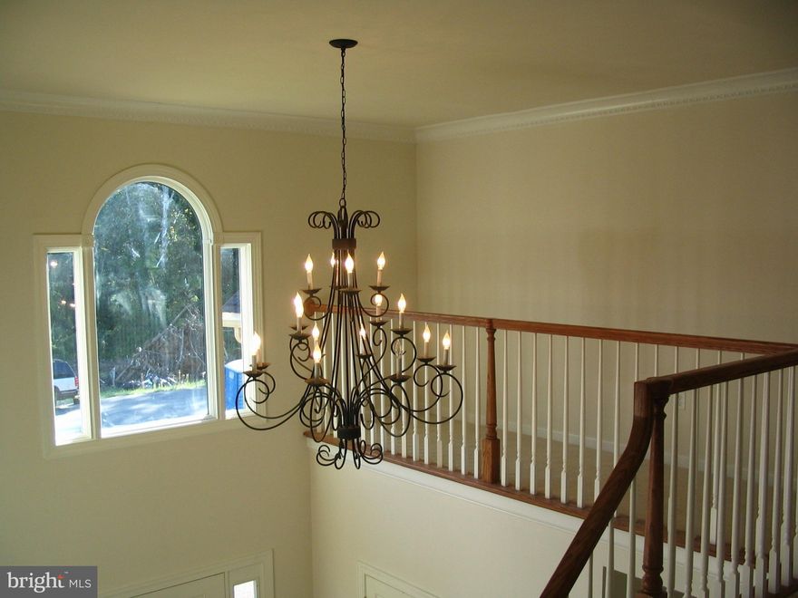 Freshly painted and made ready for you to move right into. This beautiful and spacious 4 bedroom, 2 1/2 bath home was built by a local custom home builder; and initially for his own personal use. The first floor has a large 2 story foyer, formal living room, formal dining room, family room, kitchen and breakfast area.  The second-floor primary bedroom has a full bath with a jacuzzi tub, shower, and 2 vanities and designer porcelain flooring! Also, you will find two large walk-in closets. Two bedrooms share a Jack and Jill bath.   The fourth bedroom is located right done the hall. The laundry, with a washer, dryer and utility sink, is also conveniently located on the second floor.  This grand home is located on a quiet dead-end street and in the sought after Williamsport school district. It is in an excellent commuter location close to major highways and only minutes from major shopping retailers and restaurants as well as the Prime Outlet Mall and only 15 minutes to Frederick. This luxury home is loaded with many upgrades including granite countertop, tray ceilings, crown molding, hardwood floors, fireplace. There is plenty of room for an active lifestyle including a fully finished 3rd level. It will go quickly   don't a miss it.