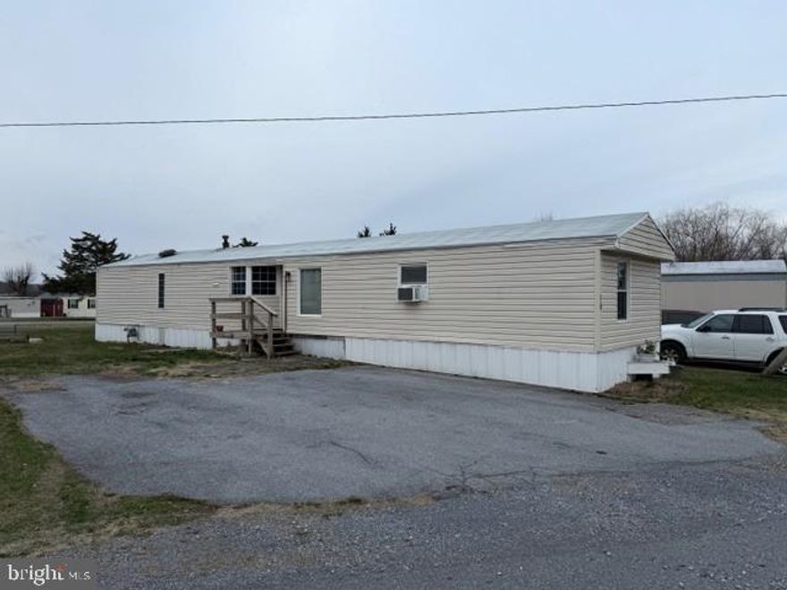 Are you ready to own your own home? Here is your chance at a very nice 2 bedroom ranch style home located close to major highways and endless shopping and dining locations. Located in a quiet park in a country like setting yet is convenient to everything you need.  Owner has recently replaced the roof and some appliances as well as painted almost the entire home.  The furnace and water heater are less than 5 yrs old and have recently been serviced. Bedrooms are located at opposite ends of the home for privacy.  Both bedrooms have spacious closets with one being a full walk in closet.   You can own this one for less than renting and start building your equity.